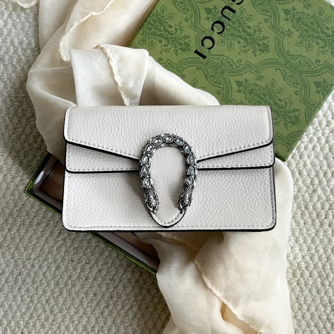 Actual shot #💰260 with box Model: 476432 White leather Size: 16.5x10x4.5cm 𝙂𝙪𝙘𝙘𝙞 𝘿𝙞𝙤𝙣𝙮𝙨𝙪𝙨 𝙈𝙞𝙣𝙞 16.5 Xiaogujia’s entry-level small bag is recommended. It’s not worth mentioning. It’s a classic model that can be said to be the symbol of Xiaogujia. The classic mini Dionysian buckle is paired with calfskin. This bag has a very high appearance rate. It is simply a tool for daily wear and is very popular on the street❗️