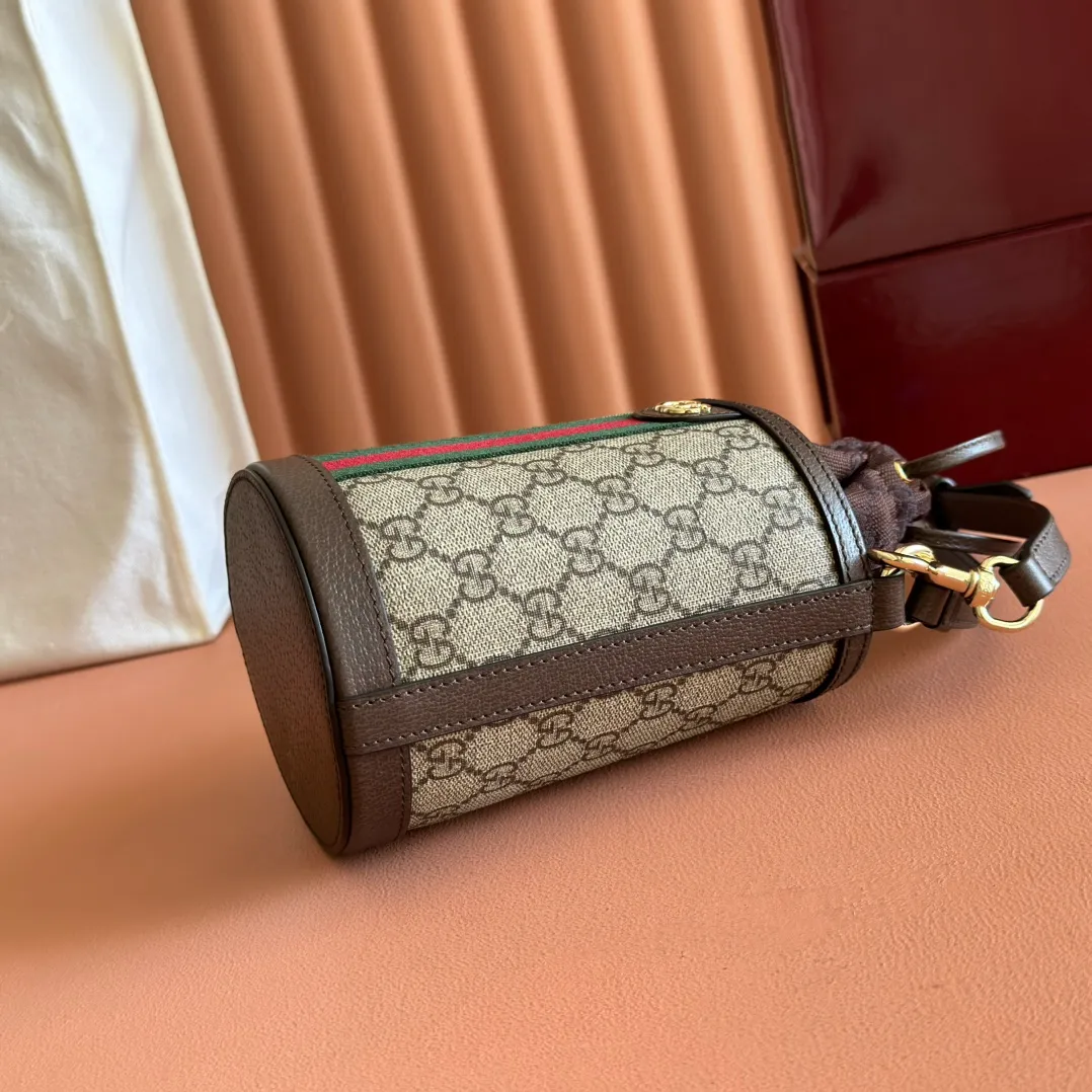 p1000💋💋💋"With full set of original counter packaging" [New Product] The Ophidia series ingeniously interprets novel silhouettes and functions, with iconic beige and brown colors, creating a bag with soft texture and fashionable style. This bucket bag features a top handle and a shoulder strap. Beige and dark brown GG monogram coated fabric Gucci Rosso Ancora leather trim Light gold tone hardware Gucci Ancora taffeta lining and green cotton linen lining Double G webbing handles (12 cm high) removable and adjustable leather shoulder strap (52 cm high) drawstring fly Ident: 838462. Dimensions: 11.5cm (width) x 23cm (height) x 8cm (depth) Weight: approx. 312g Color: brown/PVC. Made in Italy