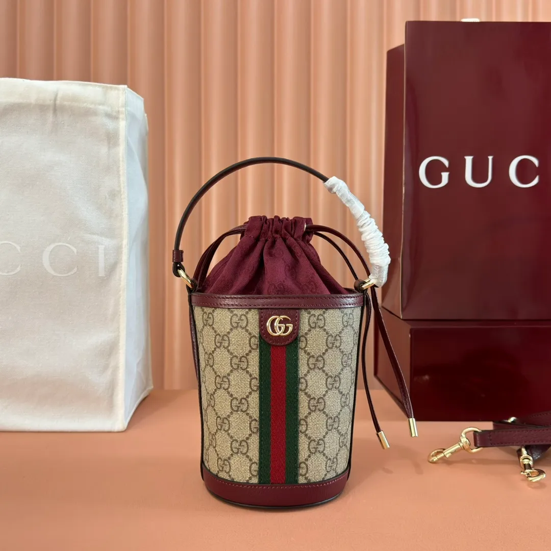 p1000💋💋💋"With full set of original counter packaging" [New Product] The Ophidia series ingeniously interprets novel silhouettes and functions, with iconic beige and brown colors, creating a bag with soft texture and fashionable style. This bucket bag features a top handle and a shoulder strap. Beige and dark brown GG monogram coated fabric Gucci Rosso Ancora leather trim Light gold tone hardware Gucci Ancora taffeta lining and green cotton linen lining Double G webbing handles (12 cm high) removable and adjustable leather shoulder strap (52 cm high) drawstring fly Ident: 838462. Dimensions: 11.5cm (width) x 23cm (height) x 8cm (depth) Weight: approx. 312g Color: Brown Anchor Red/PVC. Made in Italy