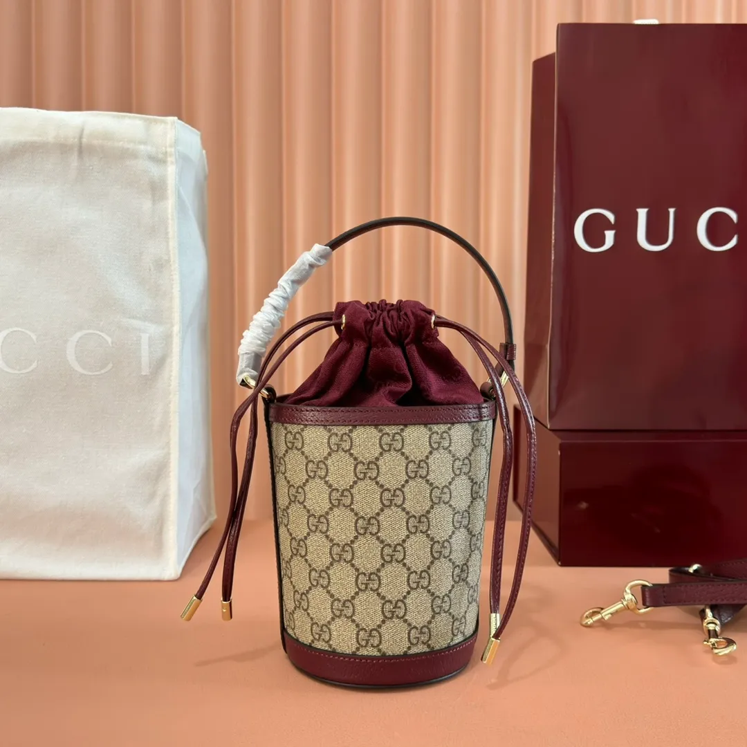 p1000💋💋💋"With full set of original counter packaging" [New Product] The Ophidia series ingeniously interprets novel silhouettes and functions, with iconic beige and brown colors, creating a bag with soft texture and fashionable style. This bucket bag features a top handle and a shoulder strap. Beige and dark brown GG monogram coated fabric Gucci Rosso Ancora leather trim Light gold tone hardware Gucci Ancora taffeta lining and green cotton linen lining Double G webbing handles (12 cm high) removable and adjustable leather shoulder strap (52 cm high) drawstring fly Ident: 838462. Dimensions: 11.5cm (width) x 23cm (height) x 8cm (depth) Weight: approx. 312g Color: Brown Anchor Red/PVC. Made in Italy