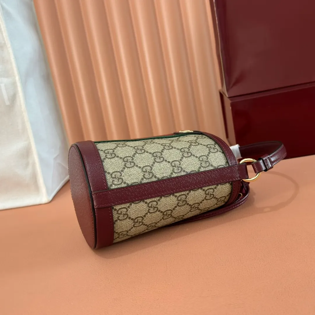 p1000💋💋💋"With full set of original counter packaging" [New Product] The Ophidia series ingeniously interprets novel silhouettes and functions, with iconic beige and brown colors, creating a bag with soft texture and fashionable style. This bucket bag features a top handle and a shoulder strap. Beige and dark brown GG monogram coated fabric Gucci Rosso Ancora leather trim Light gold tone hardware Gucci Ancora taffeta lining and green cotton linen lining Double G webbing handles (12 cm high) removable and adjustable leather shoulder strap (52 cm high) drawstring fly Ident: 838462. Dimensions: 11.5cm (width) x 23cm (height) x 8cm (depth) Weight: approx. 312g Color: Brown Anchor Red/PVC. Made in Italy