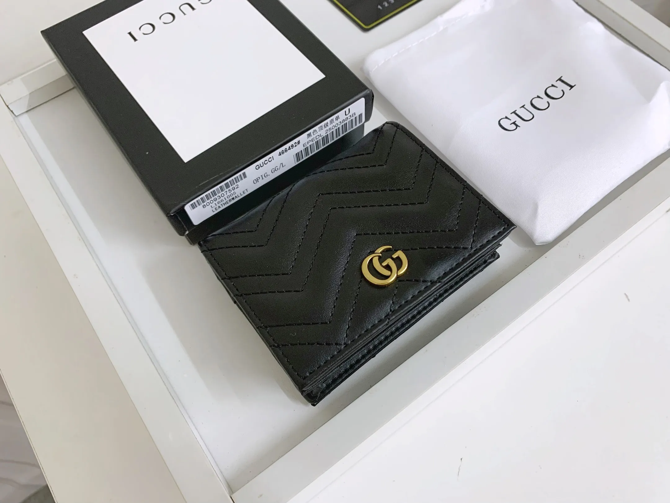 💰150 💎 Top original leather #black❤️ New model from GUCCI, counter quality, original single leather, real shot. 2021 Early Autumn New Style🔥 GG Marmont Series❣ Flip-top card holder😘 Made of soft quilted V-shaped leather 👍 Refined with top overseas hardware😍! Model: 466492 Size: 11x8.5x3cm.