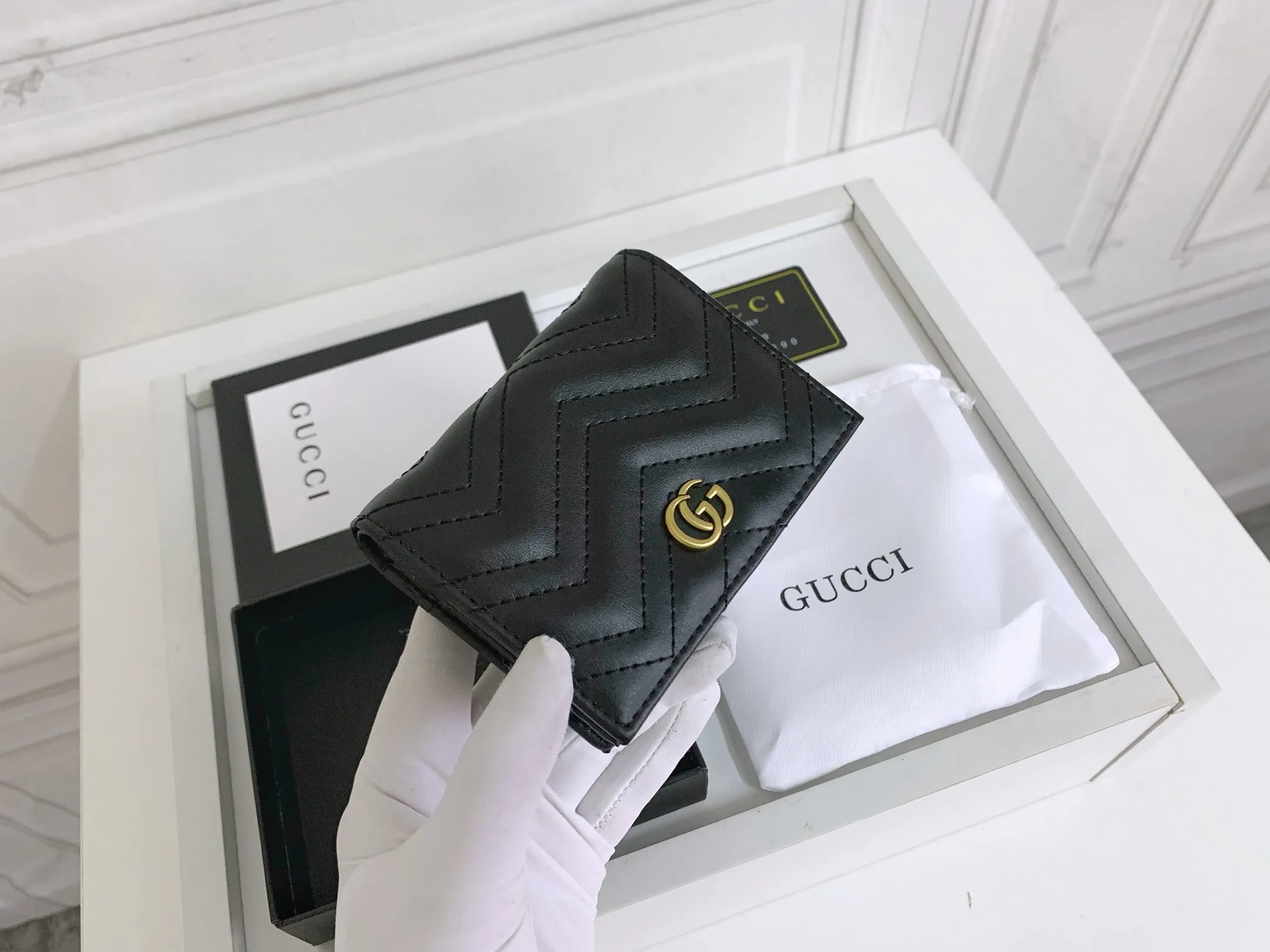 💰150 💎 Top original leather #black❤️ New model from GUCCI, counter quality, original single leather, real shot. 2021 Early Autumn New Style🔥 GG Marmont Series❣ Flip-top card holder😘 Made of soft quilted V-shaped leather 👍 Refined with top overseas hardware😍! Model: 466492 Size: 11x8.5x3cm.