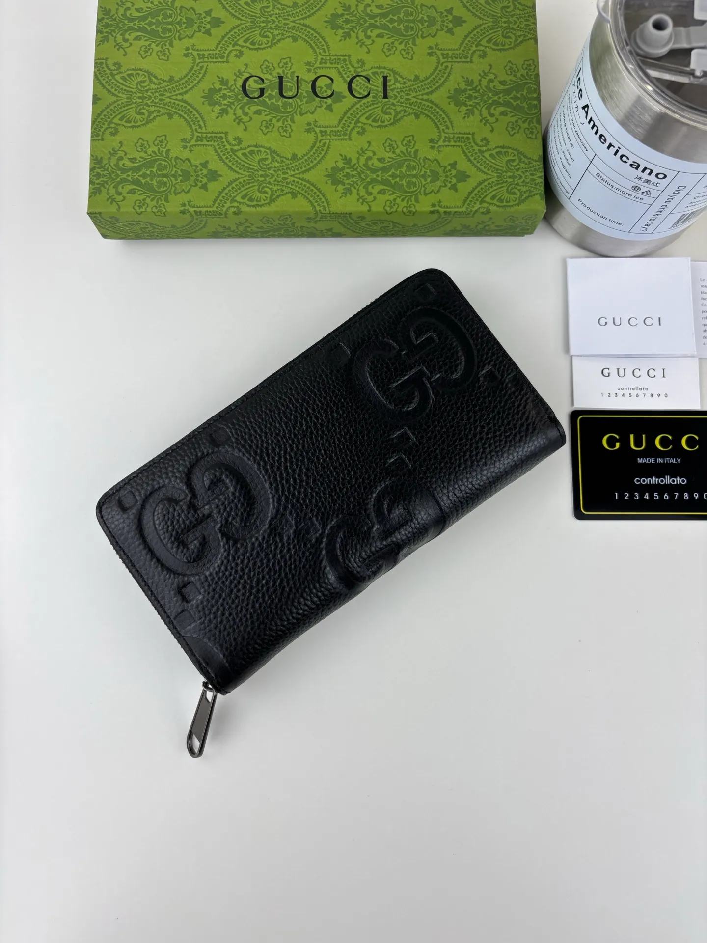 💰170 GUCCl Super Double G full zipper wallet. GG print embossing turns small daily items into fashionable daily accessories. Novel textures and finishes continue to shine in Gucci's new series, showing vitality and individual charm. This full-zip wallet is crafted from leather and features an oversized Double G logo throughout. Super Double G leather, moiré fabric lining, interior: 12 card compartments, 3 bill compartments and 1 zipped coin pocket, zip closure. Style number: 739484 Size: 19cm x 10cm x 2.5cm Color: Black pressed G