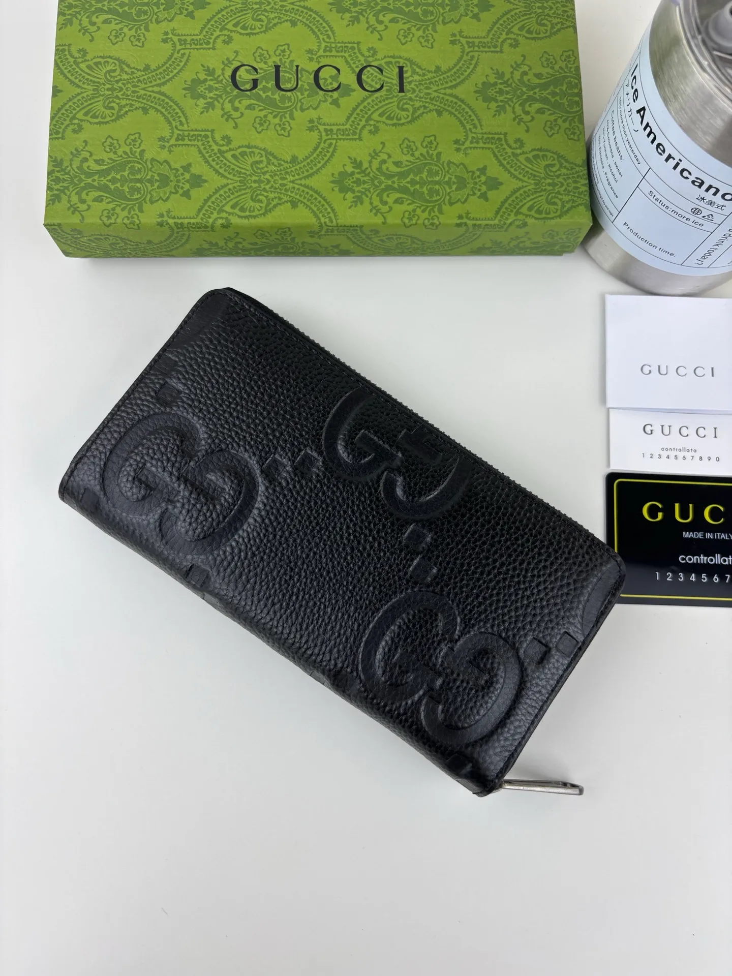 💰170 GUCCl Super Double G full zipper wallet. GG print embossing turns small daily items into fashionable daily accessories. Novel textures and finishes continue to shine in Gucci's new series, showing vitality and individual charm. This full-zip wallet is crafted from leather and features an oversized Double G logo throughout. Super Double G leather, moiré fabric lining, interior: 12 card compartments, 3 bill compartments and 1 zipped coin pocket, zip closure. Style number: 739484 Size: 19cm x 10cm x 2.5cm Color: Black pressed G