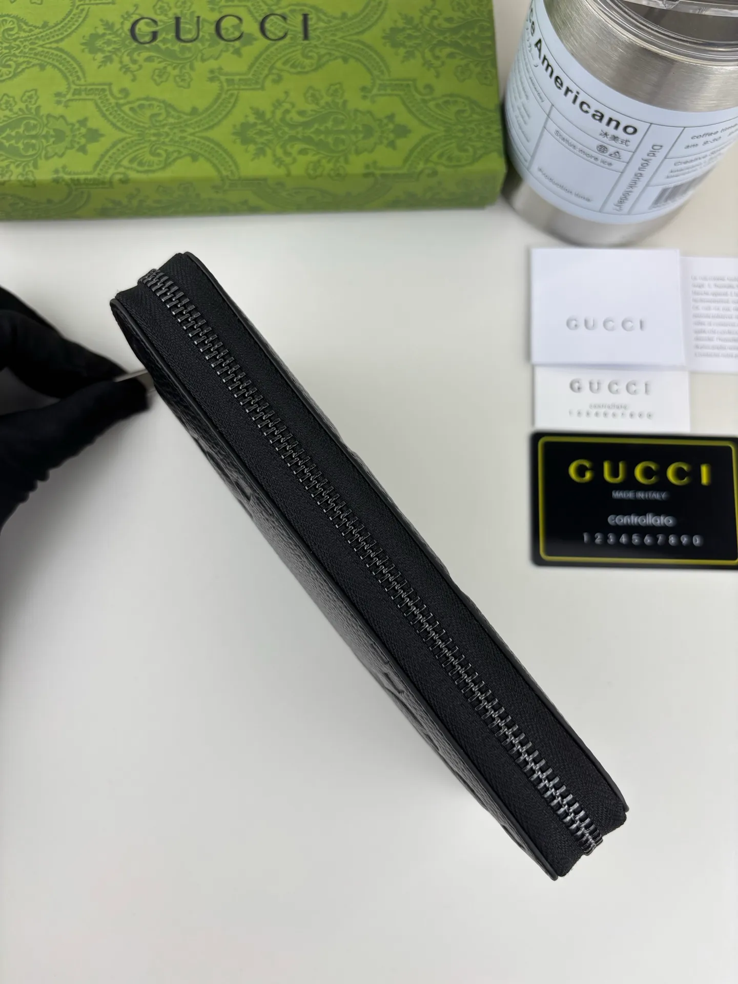 💰170 GUCCl Super Double G full zipper wallet. GG print embossing turns small daily items into fashionable daily accessories. Novel textures and finishes continue to shine in Gucci's new series, showing vitality and individual charm. This full-zip wallet is crafted from leather and features an oversized Double G logo throughout. Super Double G leather, moiré fabric lining, interior: 12 card compartments, 3 bill compartments and 1 zipped coin pocket, zip closure. Style number: 739484 Size: 19cm x 10cm x 2.5cm Color: Black pressed G