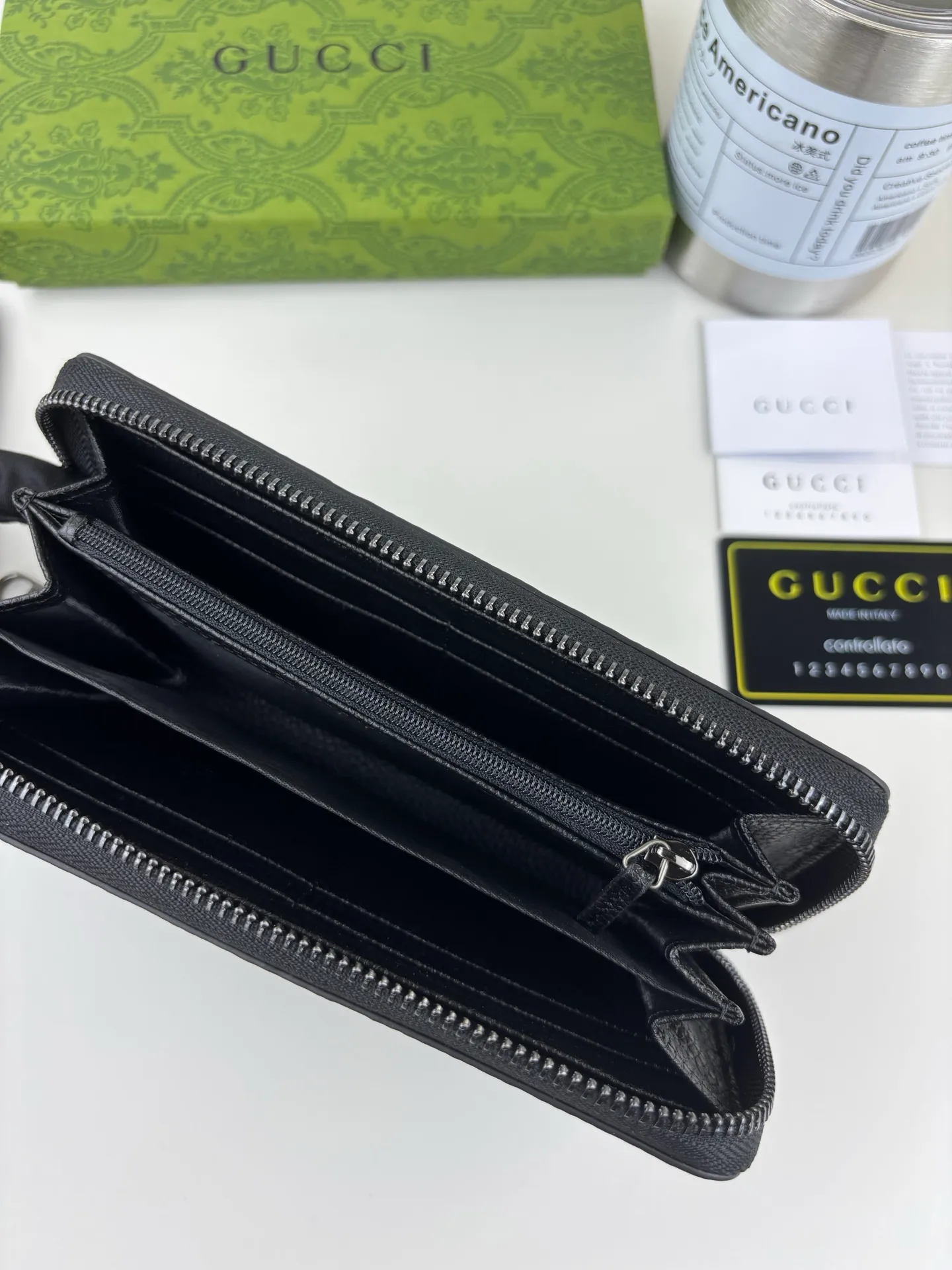 💰170 GUCCl Super Double G full zipper wallet. GG print embossing turns small daily items into fashionable daily accessories. Novel textures and finishes continue to shine in Gucci's new series, showing vitality and individual charm. This full-zip wallet is crafted from leather and features an oversized Double G logo throughout. Super Double G leather, moiré fabric lining, interior: 12 card compartments, 3 bill compartments and 1 zipped coin pocket, zip closure. Style number: 739484 Size: 19cm x 10cm x 2.5cm Color: Black pressed G