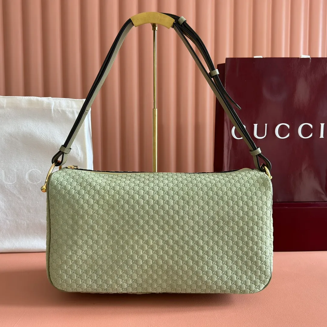 p1360. 💋💋💋【With full set of original counter packaging】The Gucci Half Horsebit series is re-presented, reinterpreting one of the brand's most iconic elements in a modern style. The collection cleverly combines relaxed silhouettes with the iconic half-horsebit hardware, which gives rise to its name. Yellow GG embossed suede Gold-tone hardware Brown cotton and linen blend lining Half horsebit closure Interior: One open pocket Adjustable leather shoulder strap (height: 33cm - 38cm) Zip closure Ident number: 862530. Dimensions: 38cm (W) x 20cm (H) x 15cm (D) Weight: Approx. 0.95kg Colour: Gray/Matte Pressed.