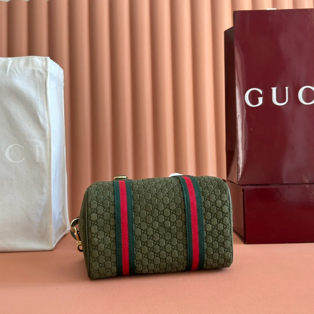p1080💋💋💋. "With full set of original counter packaging" [New Product] Inspired by Gucci's iconic travel bag silhouette, the brand launched the Mini GG handbag. This handbag is crafted from soft GG presbyopic canvas and is equipped with web handles and a detachable shoulder strap. It reinterprets the brand's classic elements and pays homage to Gucci's proud travel tradition. Beige and dark brown GG monogram coated fabric Ankara red leather trim Light gold tone hardware Green linen cotton blend lining Carry handles (10cm high) Detachable and adjustable leather shoulder strap (50cm high; Length: 101.5cm) Model number: 859975. Dimensions: 20cm (W) x 13cm (H) x 13cm (D) Weight: approx. 0.4kg Colour: Brown cloth/PVC. Made in Italy