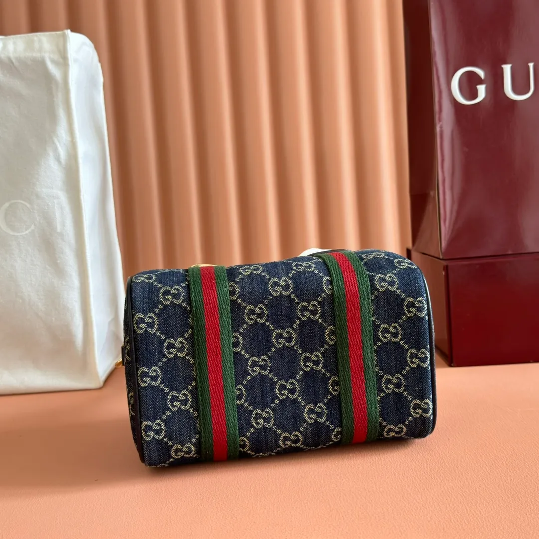 p960💋💋💋. "With full set of original counter packaging" [New Product] Inspired by Gucci's iconic travel bag silhouette, the brand launched the Mini GG handbag. This handbag is crafted from soft GG presbyopic canvas and is equipped with web handles and a detachable shoulder strap. It reinterprets the brand's classic elements and pays homage to Gucci's proud travel tradition. Beige and dark brown GG monogram coated fabric Ankara red leather trim Light gold tone hardware Green linen cotton blend lining Carry handles (10cm high) Detachable and adjustable leather shoulder strap (50cm high; Length: 101.5cm) Model number: 859975. Dimensions: 20cm (W) x 13cm (H) x 13cm (D) Weight: approx. 0.4kg Color: Denim/PVC. Made in Italy