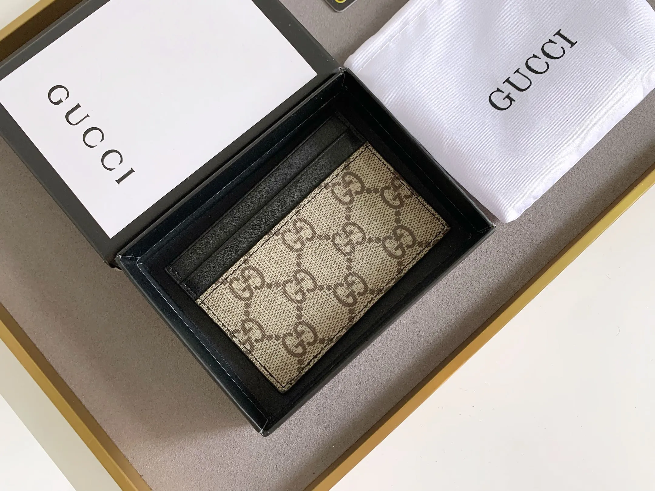 💰90 💎(Snake pattern) Top original quality, GUCCI classic popular printed card holder, exclusive background, real shot. The card holder is made of GG Supreme high-grade man-made canvas with exquisite patterns💯! Style number: 451277 Size: 10x7.5cm
