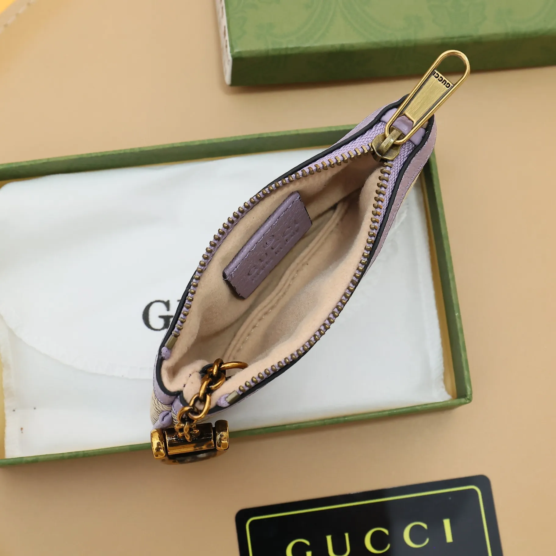 ￥140 GUCCI’s new small coin purse ~ lipstick bag🧃🧃 is made of imported calfskin with embroidered wavy pattern, 🧃🧃 matched with exquisite original factory bronze double G hardware 🧃🧃, flexible and unique hook buckle, small and exquisite, great effect, model: 671722, size: 12.5x7x1.5cm Color: purple cloth/purple U