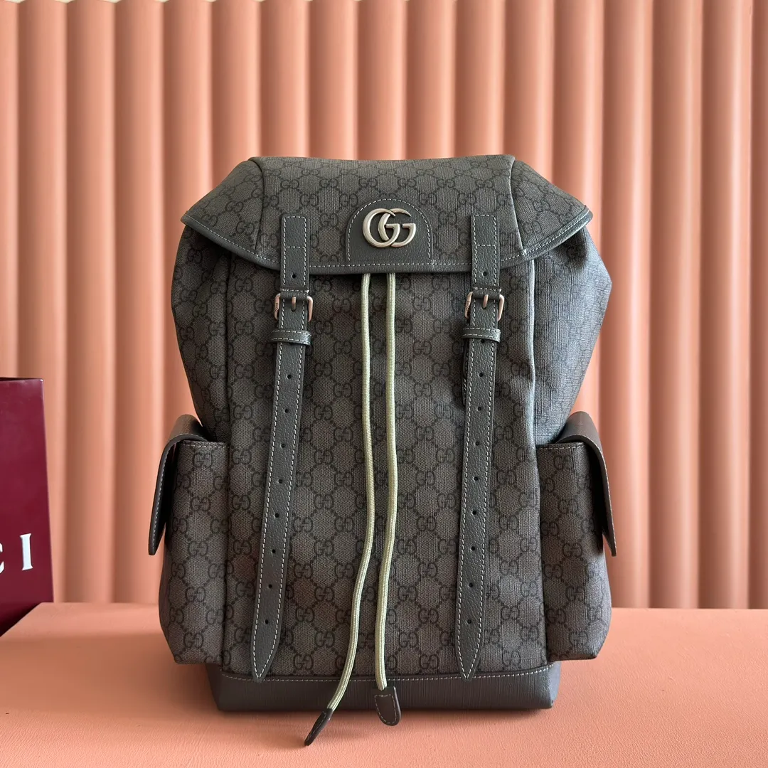 p1280. 🔥🔥🔥【With full set of original green gift bag】Ophidia series medium GG backpack. The 2024 early spring series renews the Ophidia series shoulder bags, tote bags and handbags in black GG denim, and the silver-toned accessories present a contrasting metallic texture. This Ophidia backpack in blue and black GG Supreme canvas demonstrates Gucci's design prowess in infusing the brand's iconic design elements with a modern appeal. Blue and black GG Supreme canvas, black leather piping, palladium tone hardware, cotton and linen blend lining, black mesh Double G on the back, flap side pockets with magnetic closure, inner phone pocket and padded tablet sleeve, adjustable shoulder strap, black mesh back, drawstring flap design, leather buckle fastening strap and extra magnetic buckle for easy opening and closing, weight: approx. 1.272 kg. Model: 598140. Dimensions: 40(length) x 24(width) x 16cm(thickness) Color: gray/pvc. Made in Italy