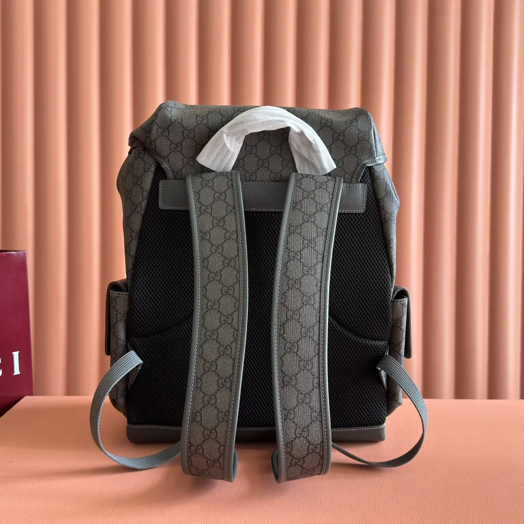 p1280. 🔥🔥🔥【With full set of original green gift bag】Ophidia series medium GG backpack. The 2024 early spring series renews the Ophidia series shoulder bags, tote bags and handbags in black GG denim, and the silver-toned accessories present a contrasting metallic texture. This Ophidia backpack in blue and black GG Supreme canvas demonstrates Gucci's design prowess in infusing the brand's iconic design elements with a modern appeal. Blue and black GG Supreme canvas, black leather piping, palladium tone hardware, cotton and linen blend lining, black mesh Double G on the back, flap side pockets with magnetic closure, inner phone pocket and padded tablet sleeve, adjustable shoulder strap, black mesh back, drawstring flap design, leather buckle fastening strap and extra magnetic buckle for easy opening and closing, weight: approx. 1.272 kg. Model: 598140. Dimensions: 40(length) x 24(width) x 16cm(thickness) Color: gray/pvc. Made in Italy