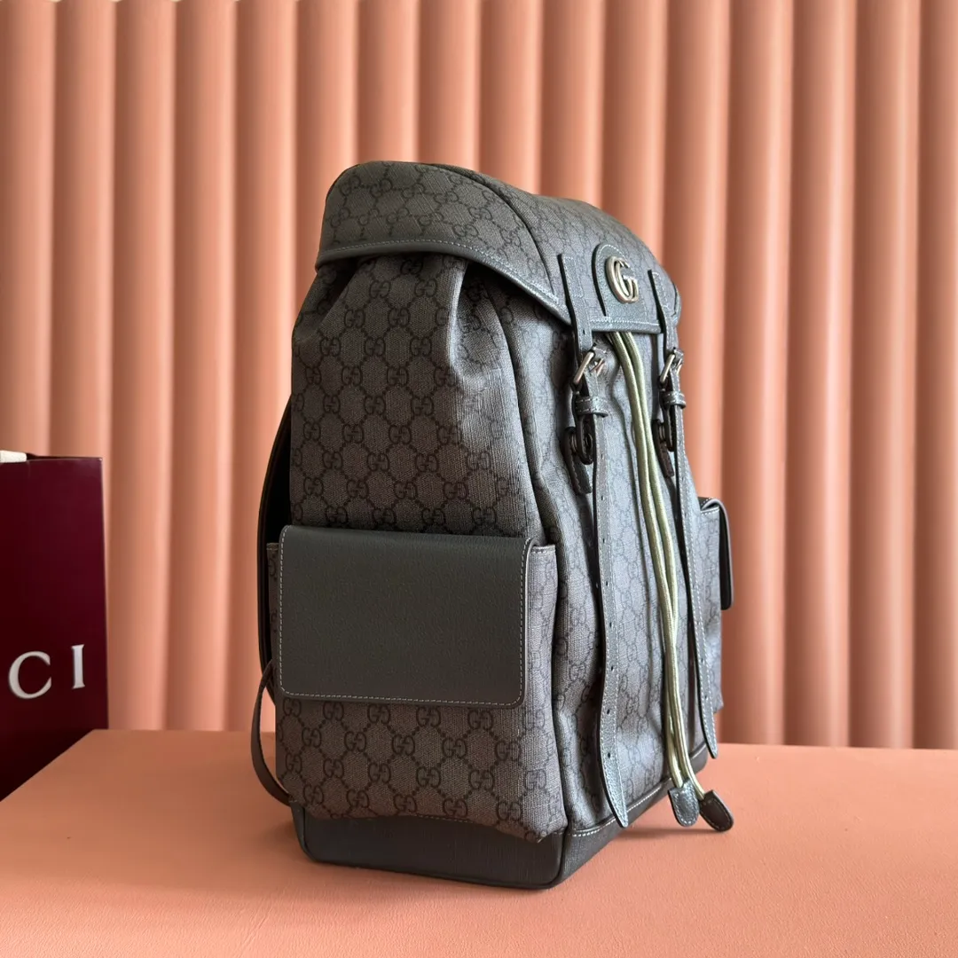 p1280. 🔥🔥🔥【With full set of original green gift bag】Ophidia series medium GG backpack. The 2024 early spring series renews the Ophidia series shoulder bags, tote bags and handbags in black GG denim, and the silver-toned accessories present a contrasting metallic texture. This Ophidia backpack in blue and black GG Supreme canvas demonstrates Gucci's design prowess in infusing the brand's iconic design elements with a modern appeal. Blue and black GG Supreme canvas, black leather piping, palladium tone hardware, cotton and linen blend lining, black mesh Double G on the back, flap side pockets with magnetic closure, inner phone pocket and padded tablet sleeve, adjustable shoulder strap, black mesh back, drawstring flap design, leather buckle fastening strap and extra magnetic buckle for easy opening and closing, weight: approx. 1.272 kg. Model: 598140. Dimensions: 40(length) x 24(width) x 16cm(thickness) Color: gray/pvc. Made in Italy