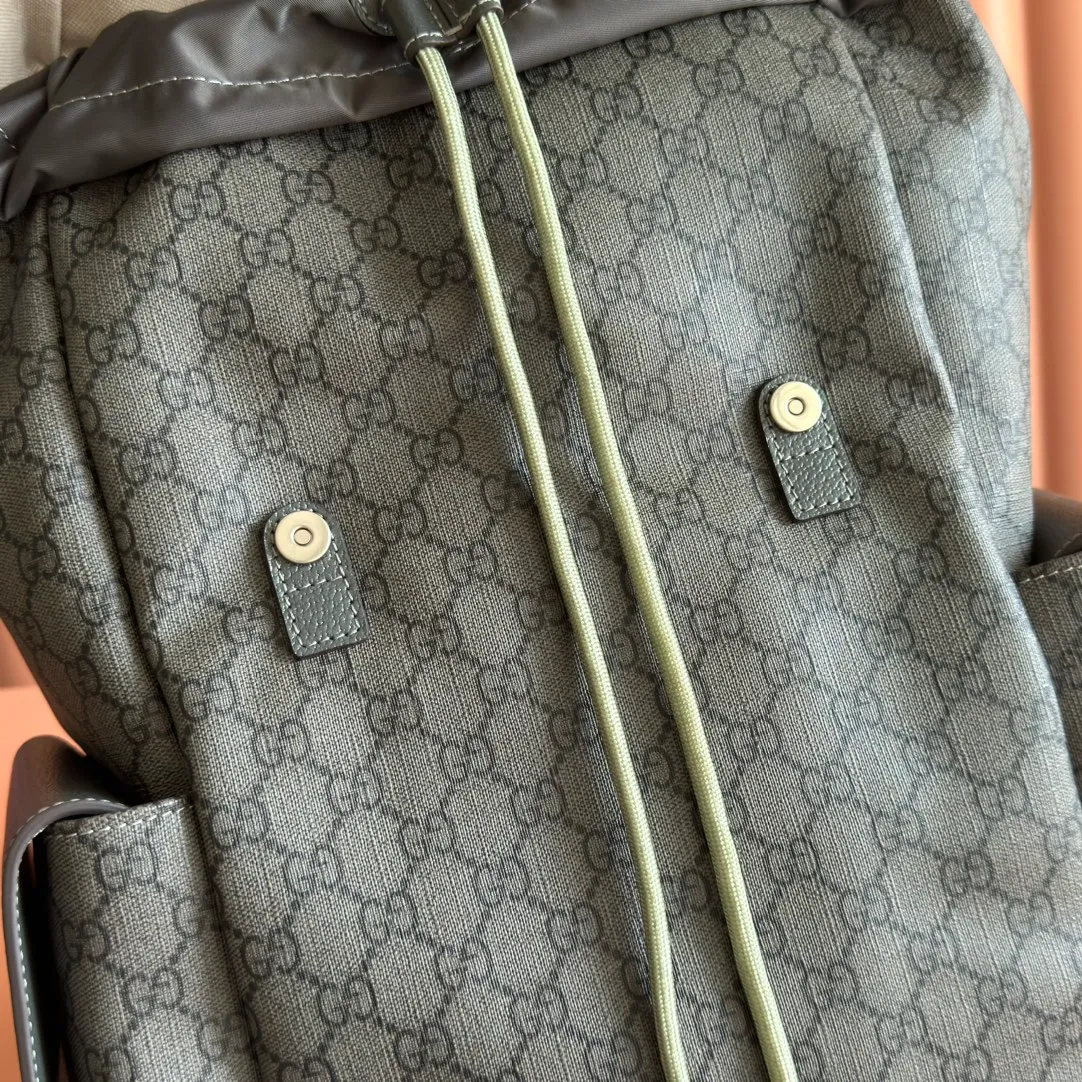 p1280. 🔥🔥🔥【With full set of original green gift bag】Ophidia series medium GG backpack. The 2024 early spring series renews the Ophidia series shoulder bags, tote bags and handbags in black GG denim, and the silver-toned accessories present a contrasting metallic texture. This Ophidia backpack in blue and black GG Supreme canvas demonstrates Gucci's design prowess in infusing the brand's iconic design elements with a modern appeal. Blue and black GG Supreme canvas, black leather piping, palladium tone hardware, cotton and linen blend lining, black mesh Double G on the back, flap side pockets with magnetic closure, inner phone pocket and padded tablet sleeve, adjustable shoulder strap, black mesh back, drawstring flap design, leather buckle fastening strap and extra magnetic buckle for easy opening and closing, weight: approx. 1.272 kg. Model: 598140. Dimensions: 40(length) x 24(width) x 16cm(thickness) Color: gray/pvc. Made in Italy