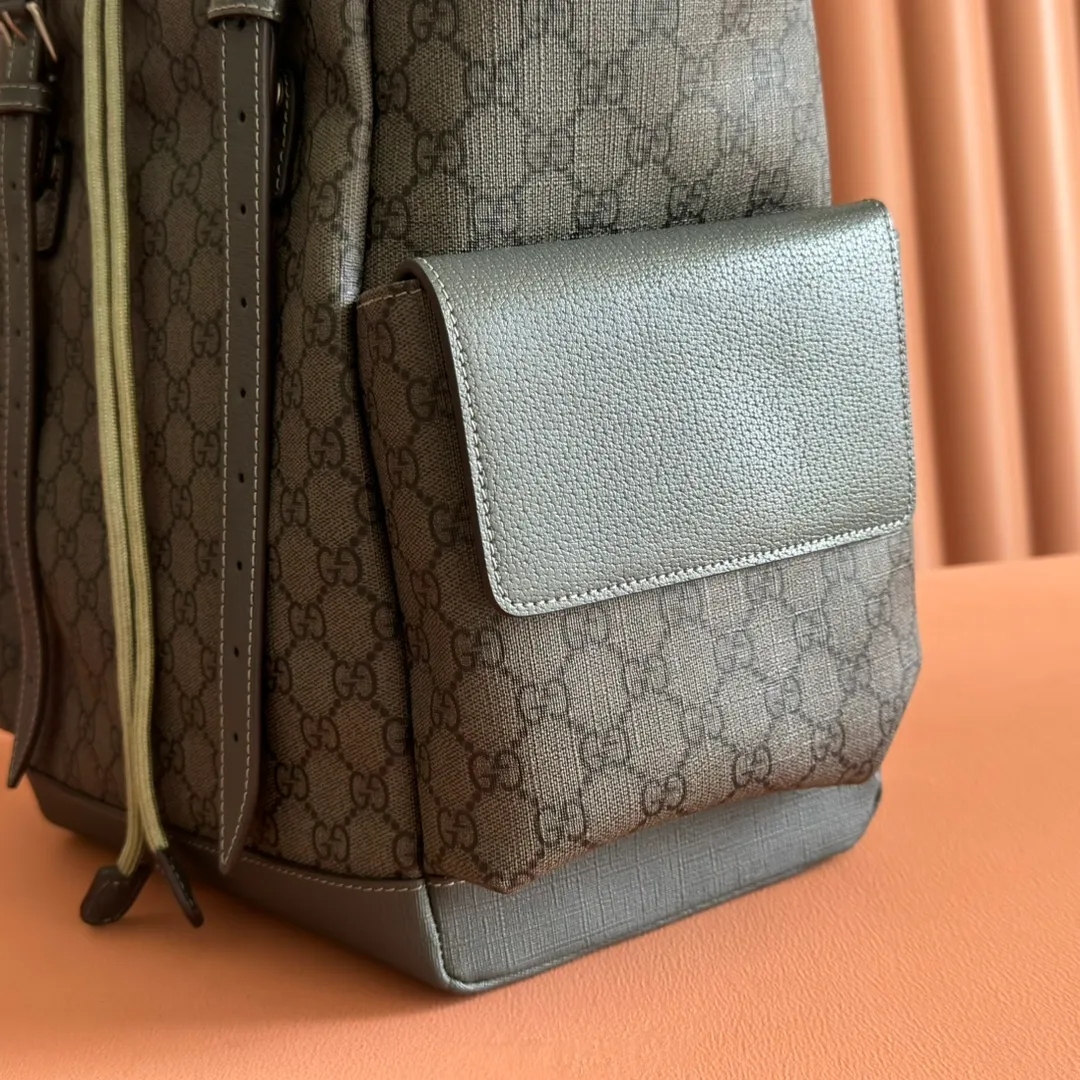 p1280. 🔥🔥🔥【With full set of original green gift bag】Ophidia series medium GG backpack. The 2024 early spring series renews the Ophidia series shoulder bags, tote bags and handbags in black GG denim, and the silver-toned accessories present a contrasting metallic texture. This Ophidia backpack in blue and black GG Supreme canvas demonstrates Gucci's design prowess in infusing the brand's iconic design elements with a modern appeal. Blue and black GG Supreme canvas, black leather piping, palladium tone hardware, cotton and linen blend lining, black mesh Double G on the back, flap side pockets with magnetic closure, inner phone pocket and padded tablet sleeve, adjustable shoulder strap, black mesh back, drawstring flap design, leather buckle fastening strap and extra magnetic buckle for easy opening and closing, weight: approx. 1.272 kg. Model: 598140. Dimensions: 40(length) x 24(width) x 16cm(thickness) Color: gray/pvc. Made in Italy