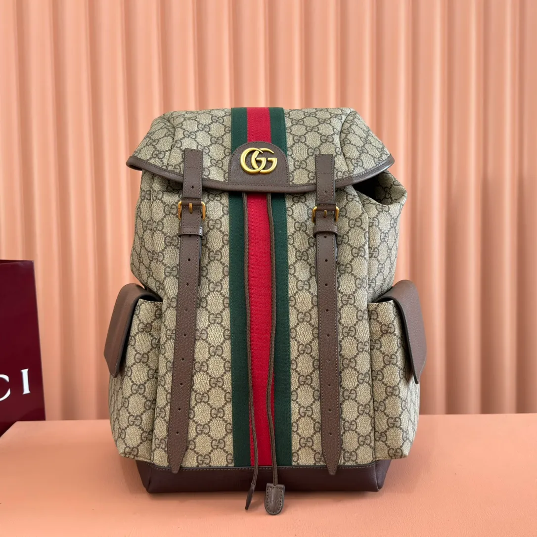p1280. 🔥🔥🔥【With full set of original green gift bag】Ophidia series medium GG backpack. The 2024 early spring series renews the Ophidia series shoulder bags, tote bags and handbags in black GG denim, and the silver-toned accessories present a contrasting metallic texture. This Ophidia backpack in blue and black GG Supreme canvas demonstrates Gucci's design prowess in infusing the brand's iconic design elements with a modern appeal. Blue and black GG Supreme canvas, black leather piping, palladium tone hardware, cotton and linen blend lining, black mesh Double G on the back, flap side pockets with magnetic closure, inner phone pocket and padded tablet sleeve, adjustable shoulder strap, black mesh back, drawstring flap design, leather buckle fastening strap and extra magnetic buckle for easy opening and closing, weight: approx. 1.272 kg. Model: 598140. Dimensions: 40(length) x 24(width) x 16cm(thick) Color: Brown/PVC. Made in Italy