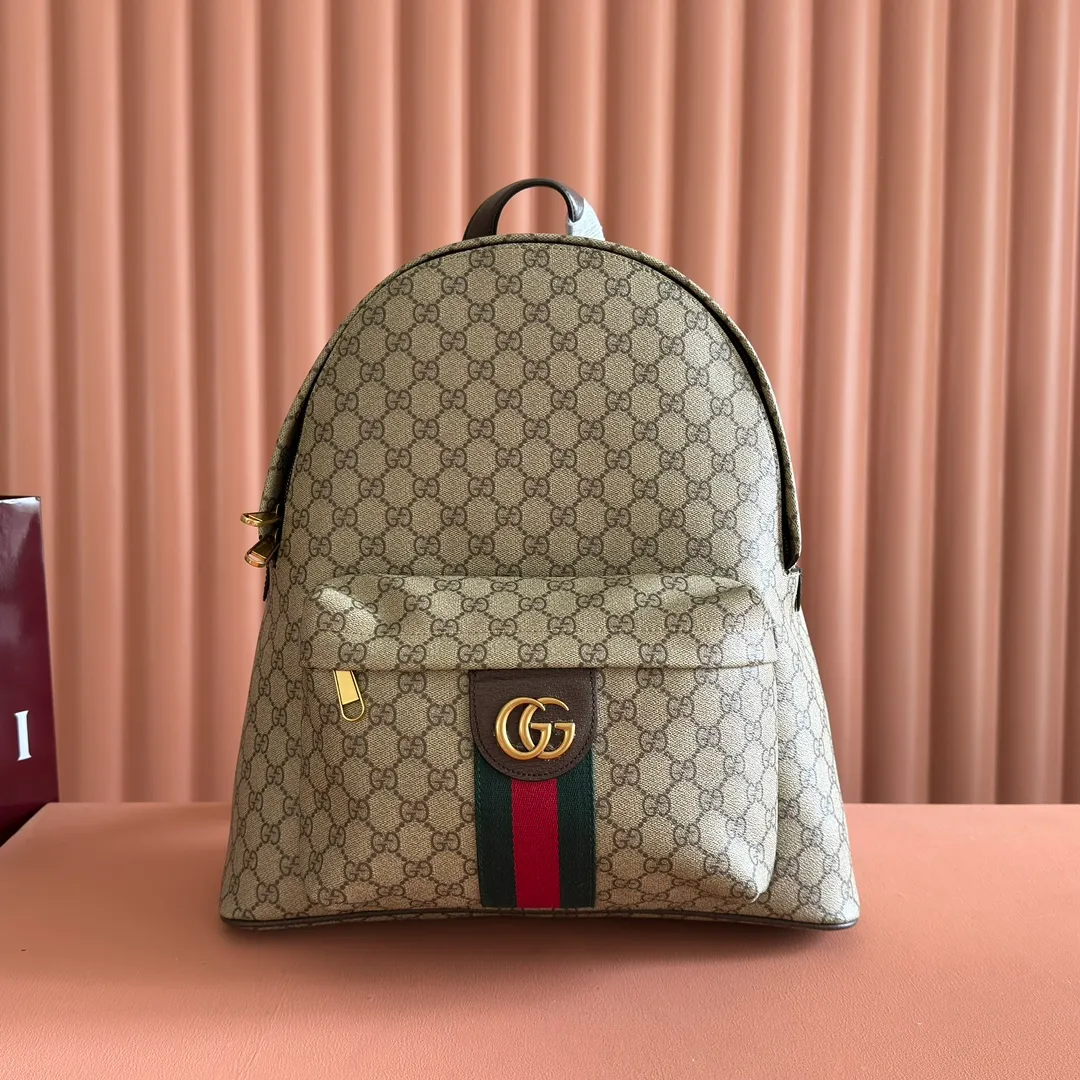 p1260💋💋💋"With full set of original counter packaging" [New product] The Ophidia series is crafted with white color matching, classic silhouette and new functional design, and is made of soft-touch fabrics. This backpack is made of soft GG Supreme material and is intricately embellished with the Double G logo and red and green webbing details. White soft GG Supreme canvas Palladium tone hardware Green nylon lining Double G Web detail Padded mesh at back Adjustable shoulder strap Interior: 1 zip pocket External: 1 zip pocket Handle height: 8 cm Zip closure Ref.: 834466. Dimensions: 36.5cm (width) x 41cm (height) x 18cm (depth) Weight: approx. 1.5kg Color: brown pvc. Made in Italy