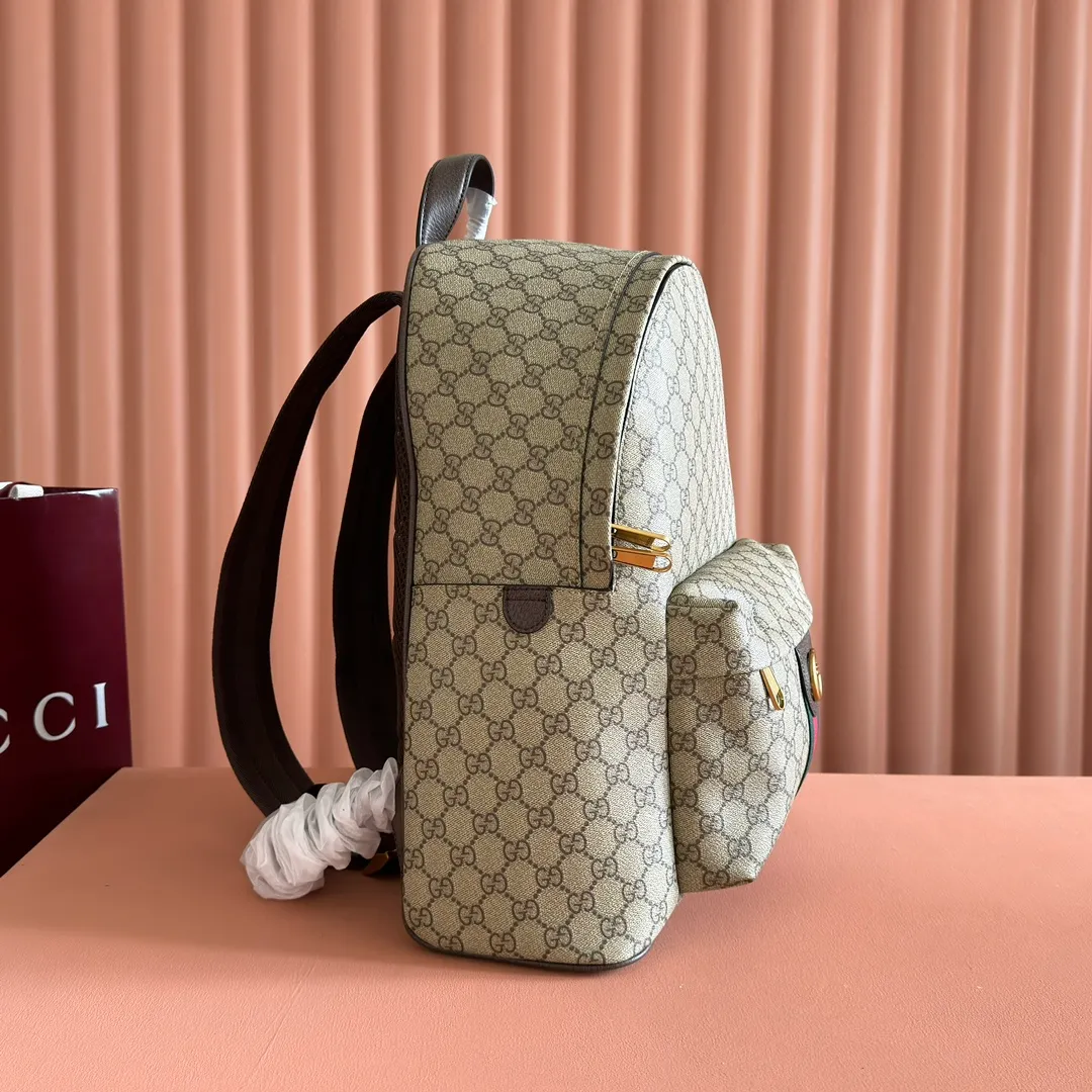 p1260💋💋💋"With full set of original counter packaging" [New product] The Ophidia series is crafted with white color matching, classic silhouette and new functional design, and is made of soft-touch fabrics. This backpack is made of soft GG Supreme material and is intricately embellished with the Double G logo and red and green webbing details. White soft GG Supreme canvas Palladium tone hardware Green nylon lining Double G Web detail Padded mesh at back Adjustable shoulder strap Interior: 1 zip pocket External: 1 zip pocket Handle height: 8 cm Zip closure Ref.: 834466. Dimensions: 36.5cm (width) x 41cm (height) x 18cm (depth) Weight: approx. 1.5kg Color: brown pvc. Made in Italy