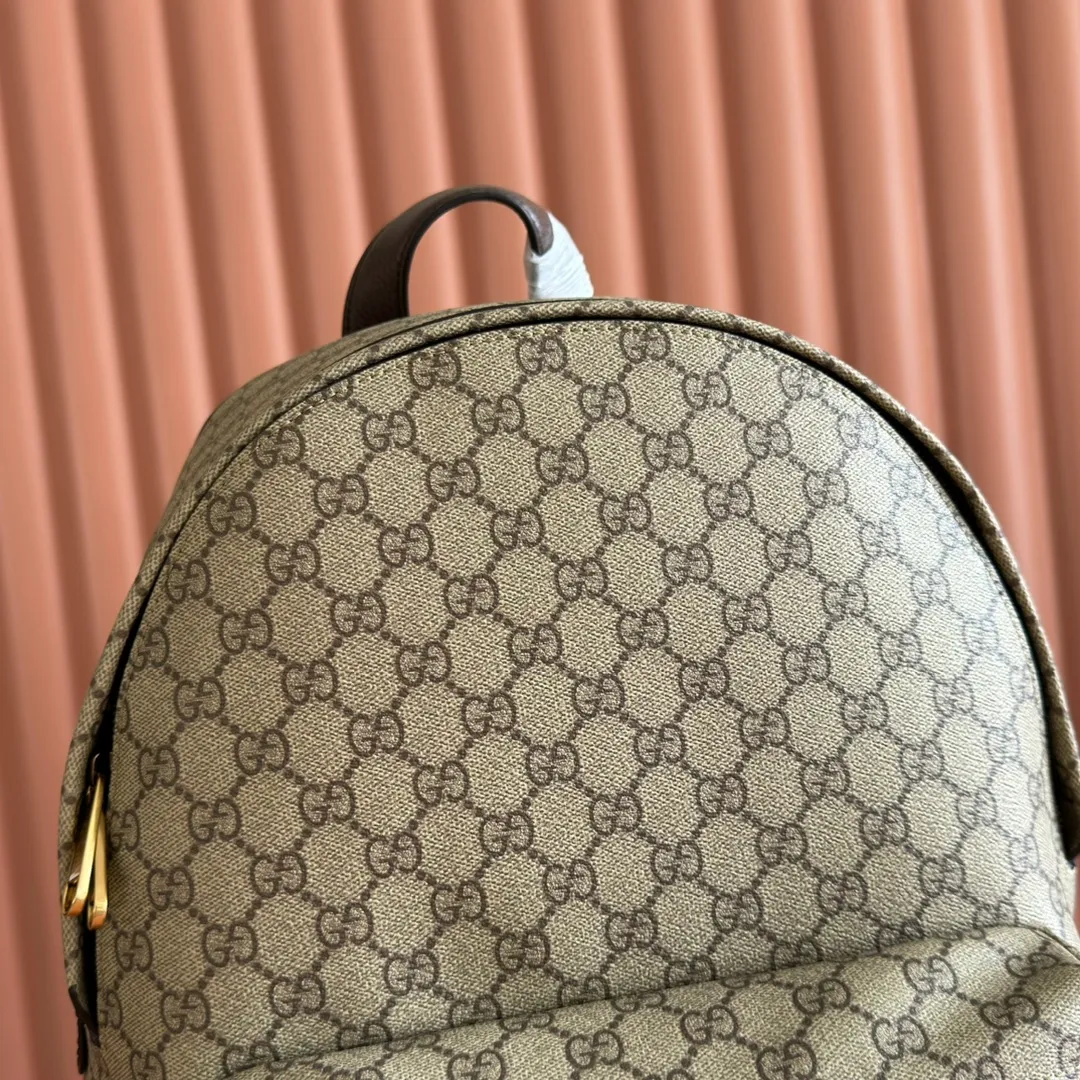 p1260💋💋💋"With full set of original counter packaging" [New product] The Ophidia series is crafted with white color matching, classic silhouette and new functional design, and is made of soft-touch fabrics. This backpack is made of soft GG Supreme material and is intricately embellished with the Double G logo and red and green webbing details. White soft GG Supreme canvas Palladium tone hardware Green nylon lining Double G Web detail Padded mesh at back Adjustable shoulder strap Interior: 1 zip pocket External: 1 zip pocket Handle height: 8 cm Zip closure Ref.: 834466. Dimensions: 36.5cm (width) x 41cm (height) x 18cm (depth) Weight: approx. 1.5kg Color: brown pvc. Made in Italy