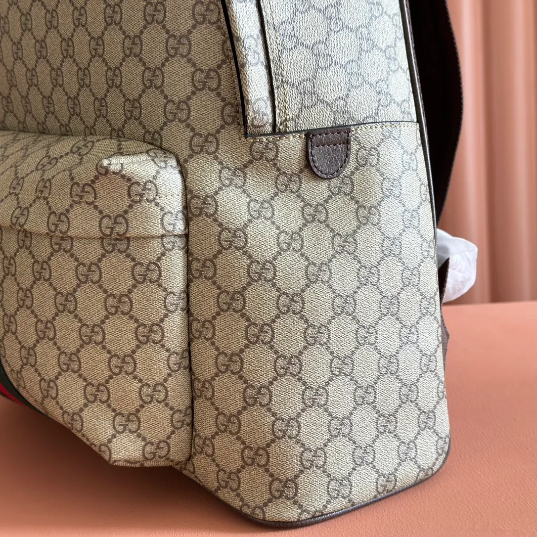 p1260💋💋💋"With full set of original counter packaging" [New product] The Ophidia series is crafted with white color matching, classic silhouette and new functional design, and is made of soft-touch fabrics. This backpack is made of soft GG Supreme material and is intricately embellished with the Double G logo and red and green webbing details. White soft GG Supreme canvas Palladium tone hardware Green nylon lining Double G Web detail Padded mesh at back Adjustable shoulder strap Interior: 1 zip pocket External: 1 zip pocket Handle height: 8 cm Zip closure Ref.: 834466. Dimensions: 36.5cm (width) x 41cm (height) x 18cm (depth) Weight: approx. 1.5kg Color: brown pvc. Made in Italy