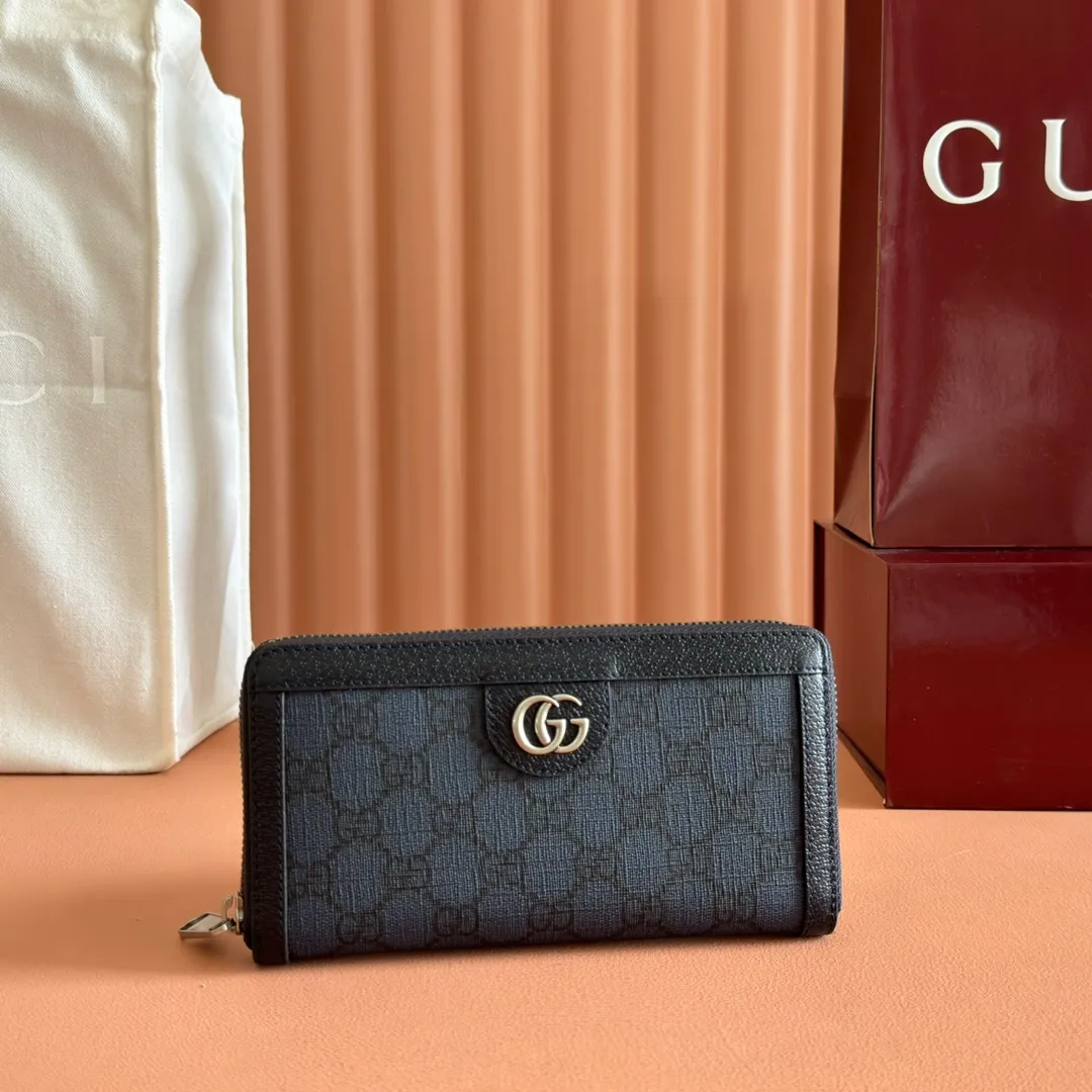 p480. 📣📣📣【Original leather accessories🌈(Cdfmall Sanya Duty Free Store Handbag)🔥🔥 The Ophidia series wallet combines the iconic double G details with the gray and black GG Supreme canvas, paying tribute to the origin of the Gucci brand through timeless matching techniques. This accessory echoes the endless retro sentiment of the Ophidia series items. Model: 706844 Size: 19*10.5*2.5 Color: blue leather/PVC.