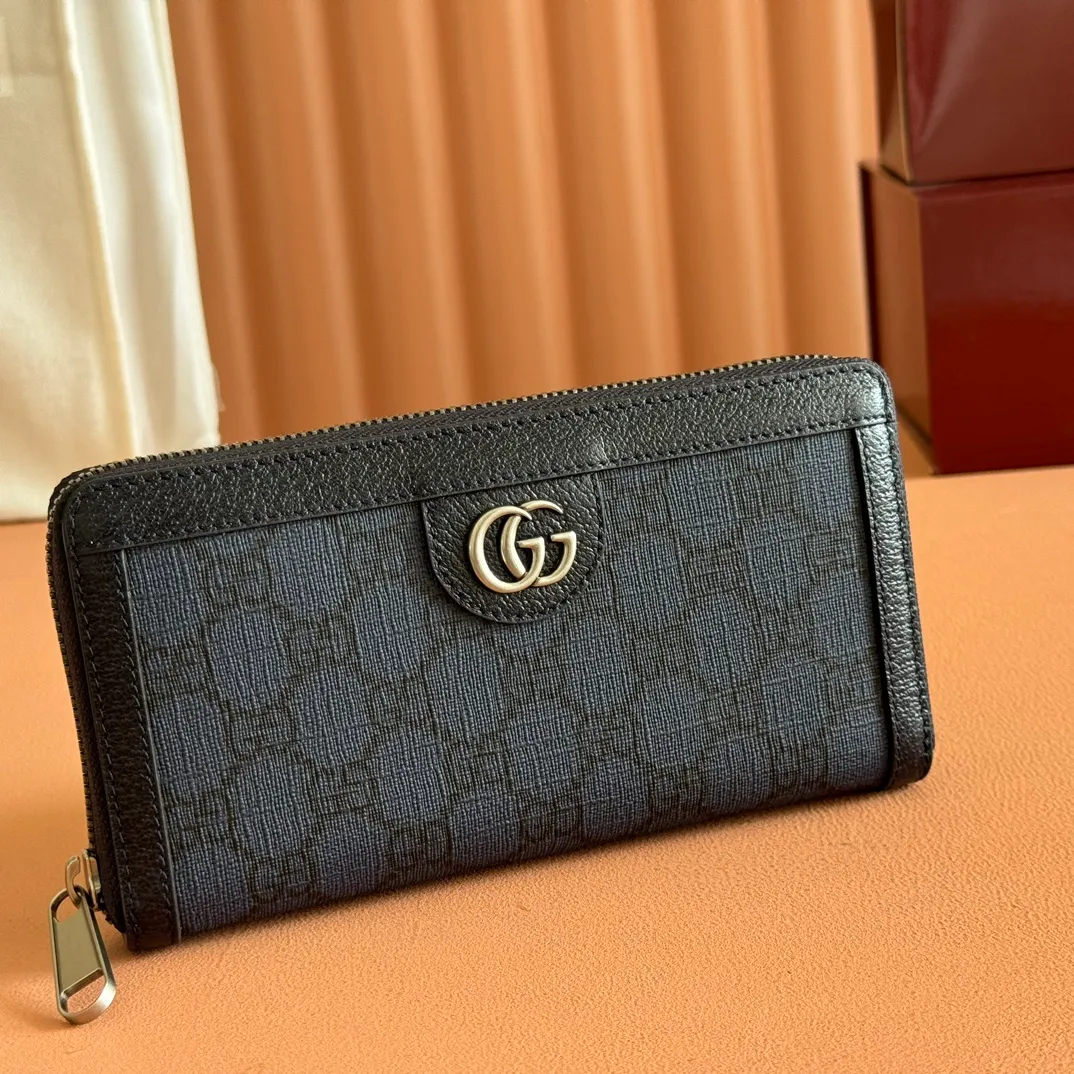 p480. 📣📣📣【Original leather accessories🌈(Cdfmall Sanya Duty Free Store Handbag)🔥🔥 The Ophidia series wallet combines the iconic double G details with the gray and black GG Supreme canvas, paying tribute to the origin of the Gucci brand through timeless matching techniques. This accessory echoes the endless retro sentiment of the Ophidia series items. Model: 706844 Size: 19*10.5*2.5 Color: blue leather/PVC.