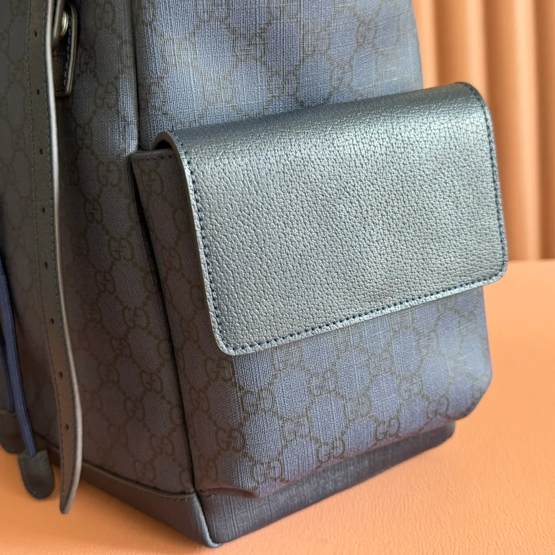 p1280. 🔥🔥🔥【With full set of original green gift bag】Ophidia series medium GG backpack. The 2024 early spring series renews the Ophidia series shoulder bags, tote bags and handbags in black GG denim, and the silver-toned accessories present a contrasting metallic texture. This Ophidia backpack in blue and black GG Supreme canvas demonstrates Gucci's design prowess in infusing the brand's iconic design elements with a modern appeal. Blue and black GG Supreme canvas, black leather piping, palladium tone hardware, cotton and linen blend lining, black mesh Double G on the back, flap side pockets with magnetic closure, inner phone pocket and padded tablet sleeve, adjustable shoulder strap, black mesh back, drawstring flap design, leather buckle fastening strap and extra magnetic buckle for easy opening and closing, weight: approx. 1.272 kg. Model: 598140. Dimensions: 40(length) x 24(width) x 16cm(thickness) Color: blue/pvc. Made in Italy