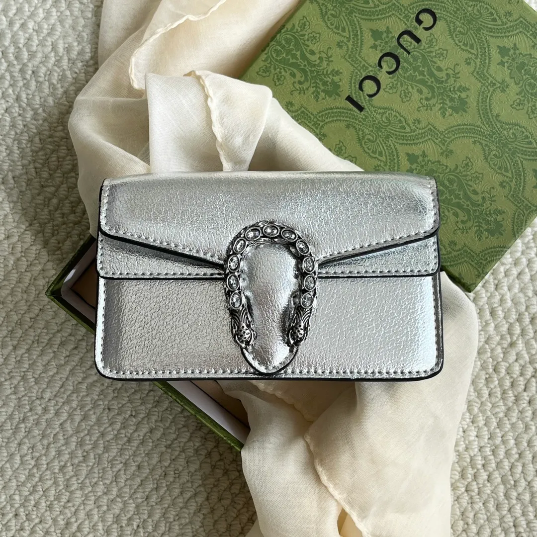 Actual shot #💰280 with box model: 476432 silver leather size: 16.5x10x4.5cm 𝙂𝙪𝙘𝙘𝙞 𝘿𝙞𝙤𝙣𝙮𝙨𝙪𝙨 𝙈𝙞𝙣𝙞 16.5 Xiaogujia’s entry-level small bag is recommended. It’s not worth mentioning. It’s a classic model that can be said to be the symbol of Xiaogujia. The classic mini Dionysian buckle is paired with calfskin. This bag has a very high appearance rate. It is simply a tool for daily wear and is very popular on the street❗️