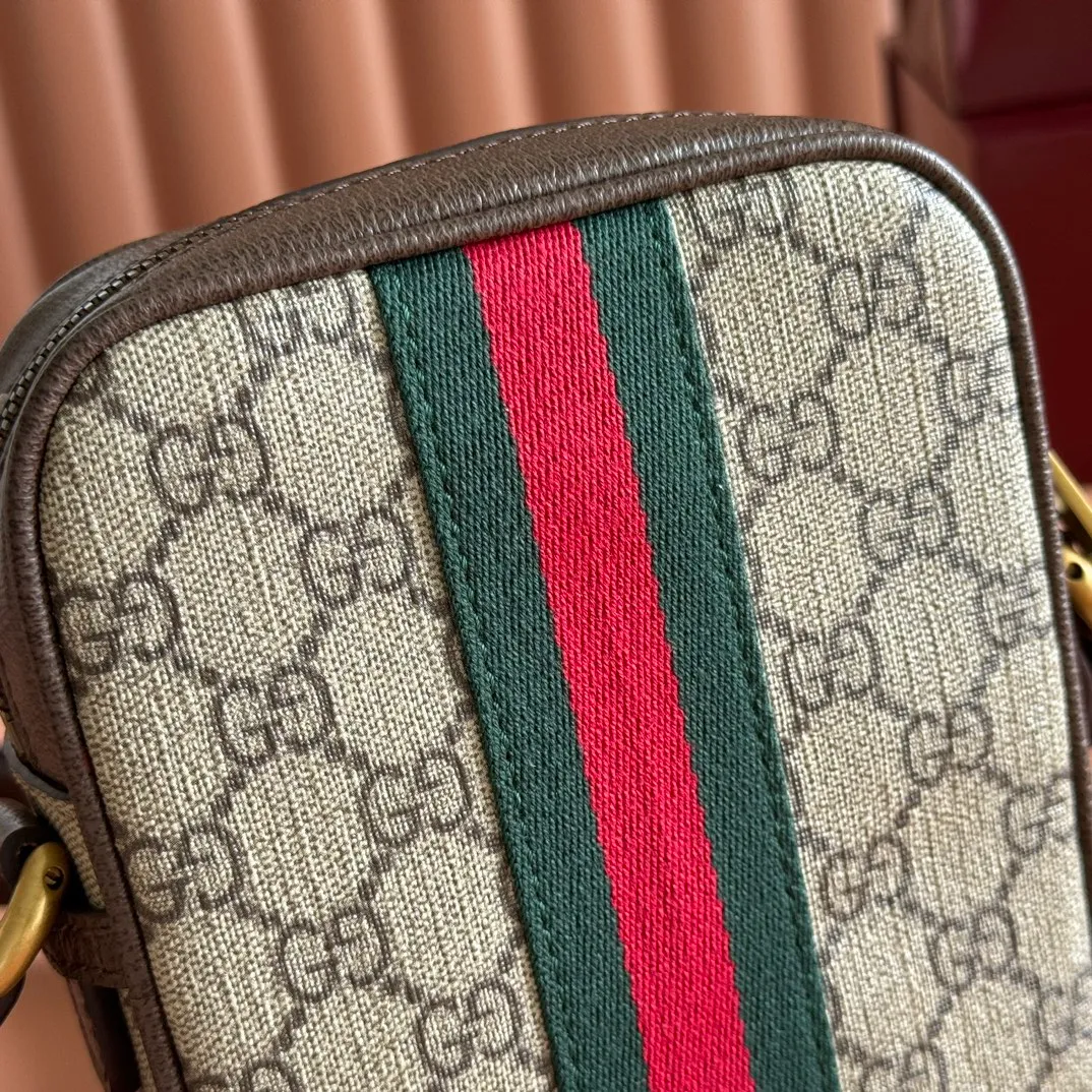 p740. 📣📣📣[Original leather accessories🌈 Equipped with full set of counter packaging]🔥🔥 Introduction to the new model of G family: Immersed in retro sentiments, the Ophidia family has welcomed a new member - the square shape of the medium handbag is reminiscent of retro design. The GG high-grade man-made canvas material is embellished with red and blue webbing and other classic elements of the brand, which reflect the tribute to the brand's equestrian roots. Ophidia Web Model: 598127. Size: 14.5*18*6cm. Color: brown/PVC