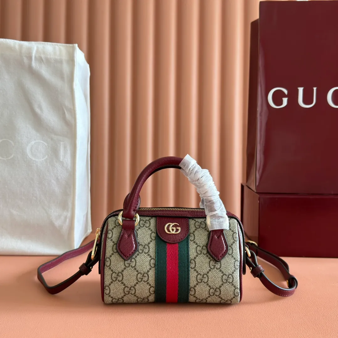 p900. 💋💋💋"With full set of original counter packaging" [New Product] The Ophidia series ingeniously interprets novel silhouettes and functions, with iconic beige and brown colors, creating a bag with soft texture and fashionable style. This Boston bag comes in a mini version. Beige and dark brown GG monogram coated fabric Ankara red leather trim Light gold-toned hardware Green linen-cotton blend lining Double G Webbing Handles (6 cm high) Adjustable leather shoulder strap Height: 54 cm Zip closure Ident.: 838478. Dimensions: 16cm (width) x 10cm (height) x 9cm (depth) Weight: approx. 276g Color: Brown Ankora/PVC. Made in Italy