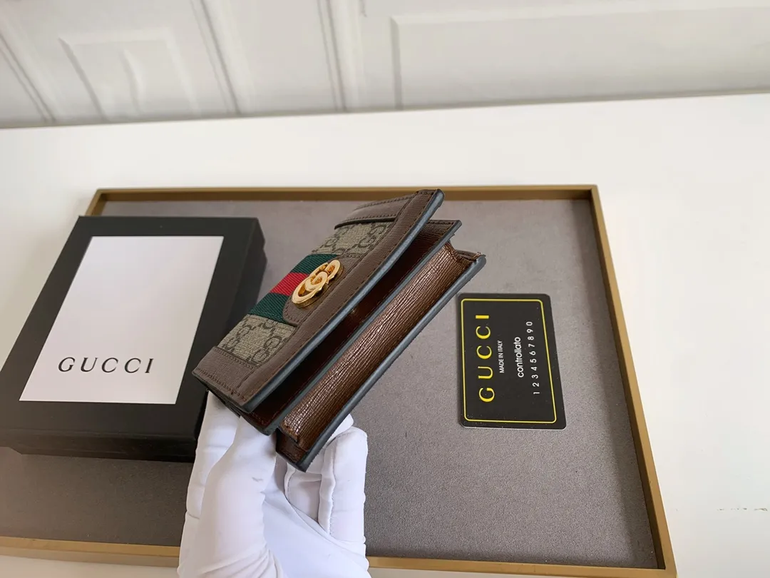💰150 Top Original 💎gucci·leather ‼ ‼ Made of imported original leather, grained cow leather, paired with ebony double G fabric, and gold hardware accessories. Model: 523155 Brown Size 11cm*8.5cm*2.5cm