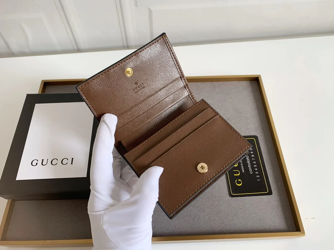💰150 Top Original 💎gucci·leather ‼ ‼ Made of imported original leather, grained cow leather, paired with ebony double G fabric, and gold hardware accessories. Model: 523155 Brown Size 11cm*8.5cm*2.5cm