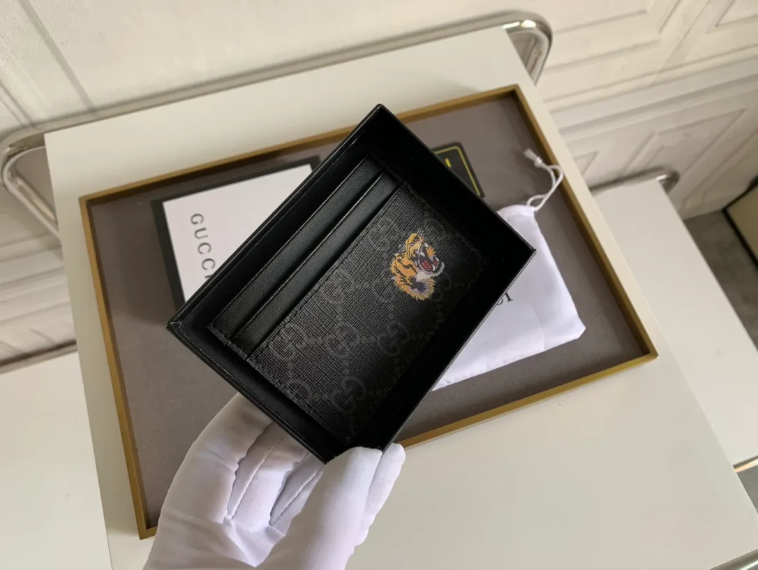 💰90 💎 (Tiger pattern) Top original quality, GUCCI classic popular printed card holder, exclusive background, real shot. The card holder is made of GG Supreme high-grade man-made canvas with exquisite patterns💯! Style number: 451277 Size: 10x7.5cm