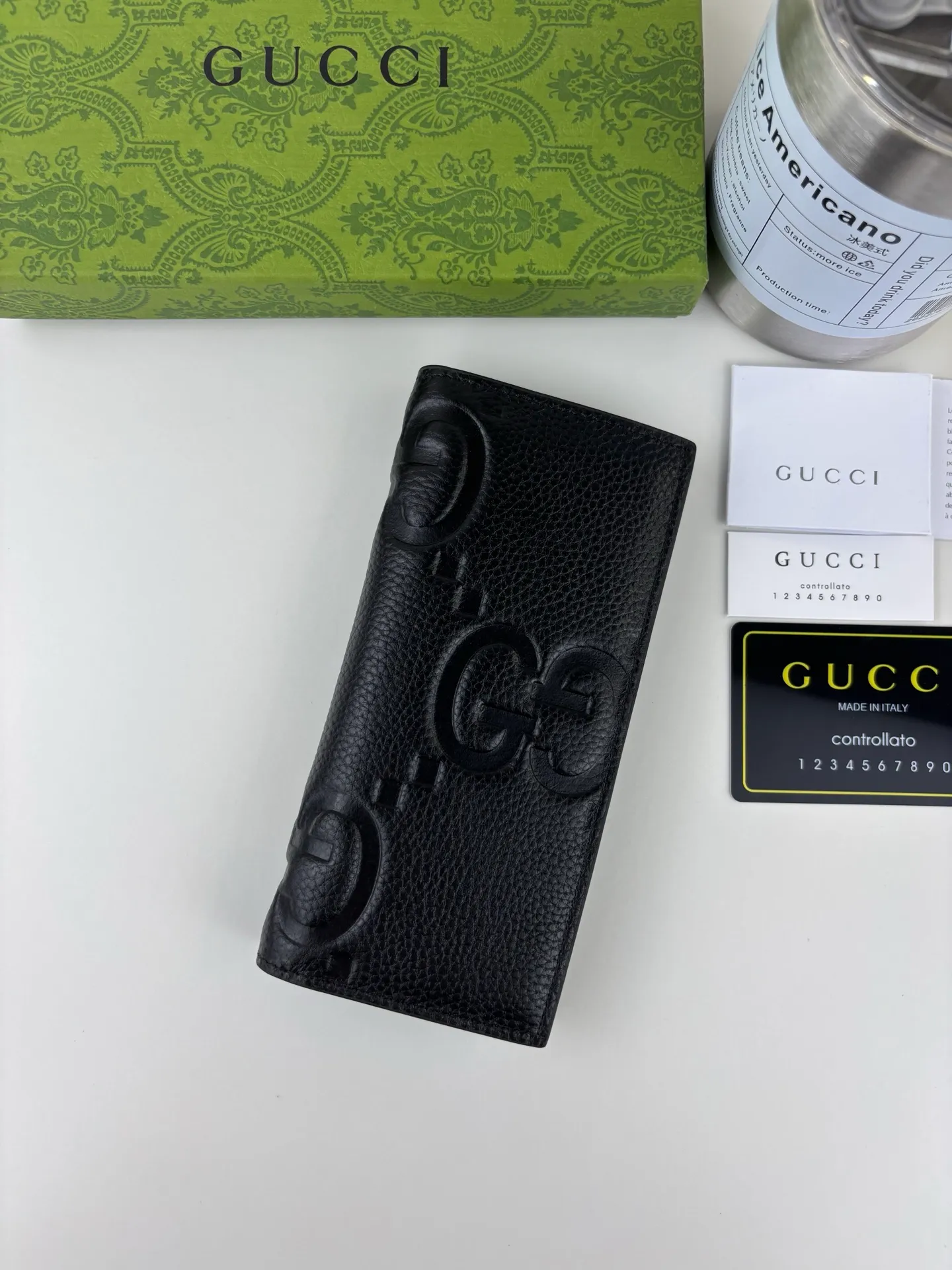 💰150 GUCCl super double G long clip wallet. GG print embossing turns small daily items into fashionable daily accessories. Novel textures and finishes continue to shine in Gucci's new series, showing vitality and individual charm. This full-zip wallet is crafted from leather and features an oversized Double G logo throughout. Super Double G leather, moiré fabric lining. Style number: 739486 Size: 18.5cm x 8cm Color: Black pressed G