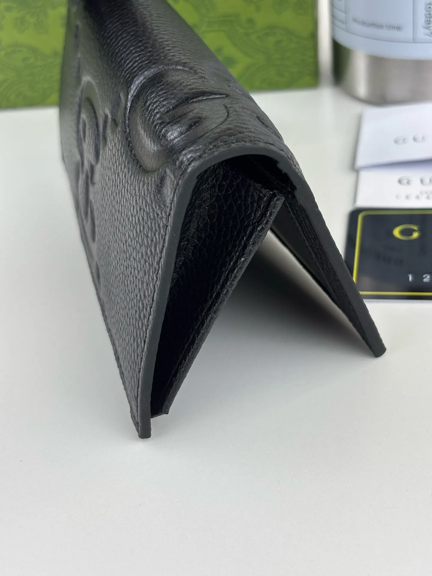 💰150 GUCCl super double G long clip wallet. GG print embossing turns small daily items into fashionable daily accessories. Novel textures and finishes continue to shine in Gucci's new series, showing vitality and individual charm. This full-zip wallet is crafted from leather and features an oversized Double G logo throughout. Super Double G leather, moiré fabric lining. Style number: 739486 Size: 18.5cm x 8cm Color: Black pressed G