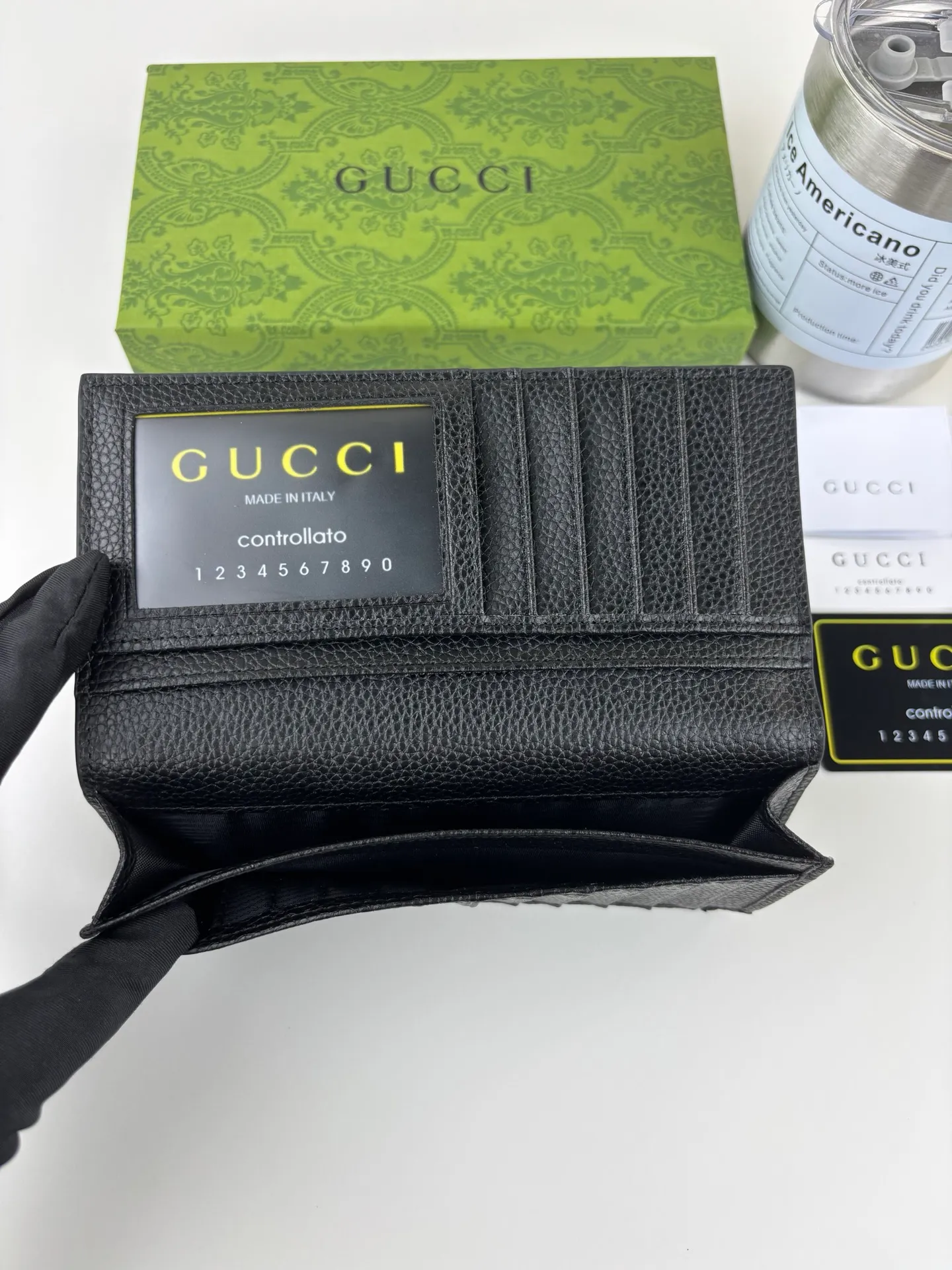 💰150 GUCCl super double G long clip wallet. GG print embossing turns small daily items into fashionable daily accessories. Novel textures and finishes continue to shine in Gucci's new series, showing vitality and individual charm. This full-zip wallet is crafted from leather and features an oversized Double G logo throughout. Super Double G leather, moiré fabric lining. Style number: 739486 Size: 18.5cm x 8cm Color: Black pressed G