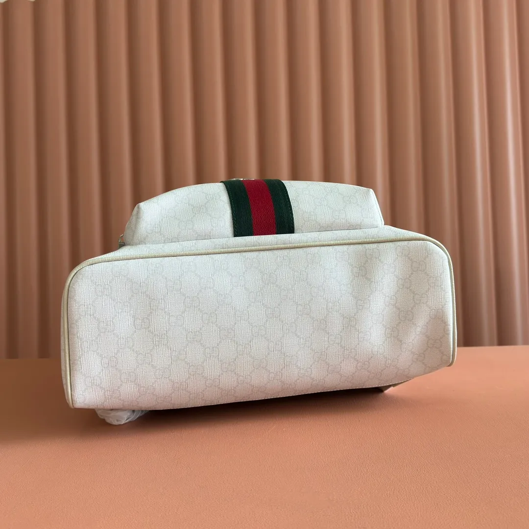 p1260💋💋💋"With full set of original counter packaging" [New product] The Ophidia series is crafted with white color matching, classic silhouette and new functional design, and is made of soft-touch fabrics. This backpack is made of soft GG Supreme material and is intricately embellished with the Double G logo and red and green webbing details. White soft GG Supreme canvas Palladium tone hardware Green nylon lining Double G Web detail Padded mesh at back Adjustable shoulder strap Interior: 1 zip pocket External: 1 zip pocket Handle height: 8 cm Zip closure Ref.: 834466. Dimensions: 36.5cm (width) x 41cm (height) x 18cm (depth) Weight: approx. 1.5kg Color: white pvc. Made in Italy