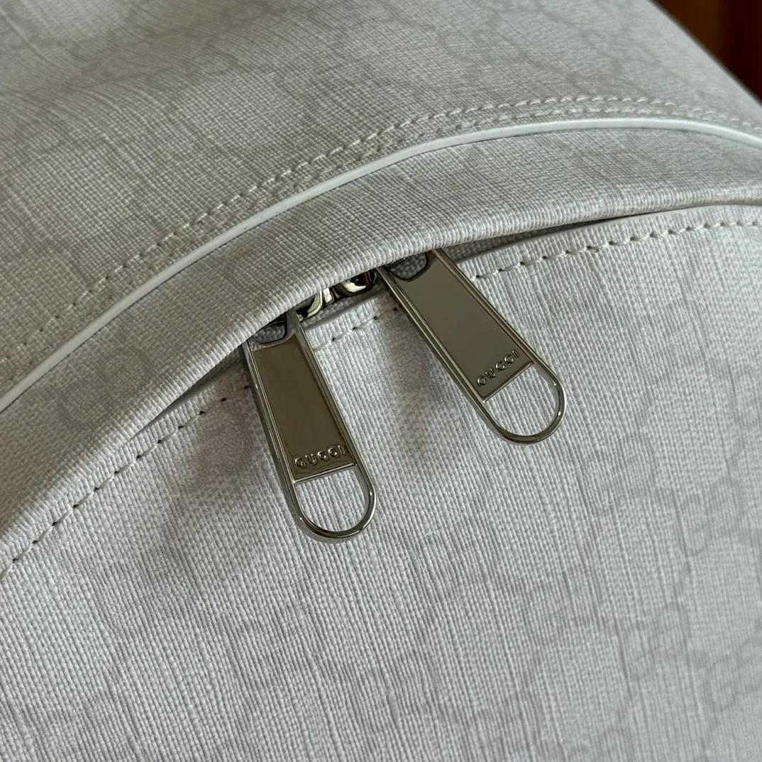 p1260💋💋💋"With full set of original counter packaging" [New product] The Ophidia series is crafted with white color matching, classic silhouette and new functional design, and is made of soft-touch fabrics. This backpack is made of soft GG Supreme material and is intricately embellished with the Double G logo and red and green webbing details. White soft GG Supreme canvas Palladium tone hardware Green nylon lining Double G Web detail Padded mesh at back Adjustable shoulder strap Interior: 1 zip pocket External: 1 zip pocket Handle height: 8 cm Zip closure Ref.: 834466. Dimensions: 36.5cm (width) x 41cm (height) x 18cm (depth) Weight: approx. 1.5kg Color: white pvc. Made in Italy