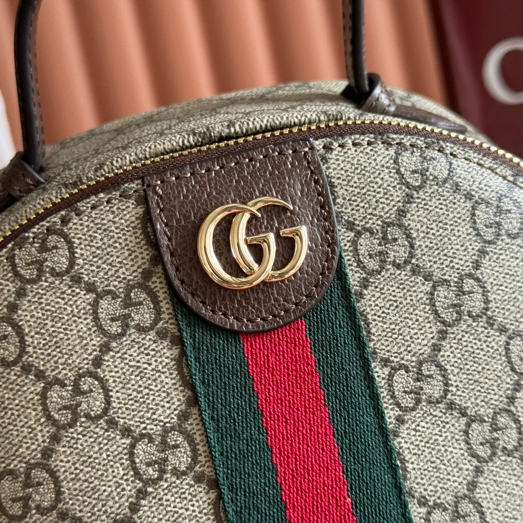 p1100. 💋💋💋"With full set of original counter packaging" [New Product] The Ophidia series dazzlingly presents novel silhouettes and functions. It is ingeniously interpreted in iconic beige and brown colors to create an innovative bag with soft texture. Beige and dark brown GG monogram coated fabric Brown leather trim Gold-toned hardware Green cotton lining Double G webbing Model: 836856. Dimensions: 23.5cm (width) x 30cm (height) x 13cm (depth) Color: Brown/PVC. Made in Italy