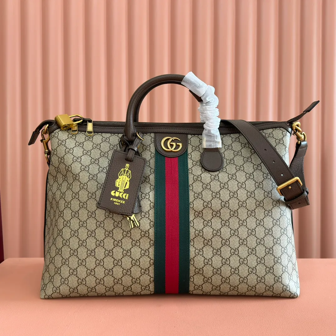 p1420. 💋💋💋"With original gift bag" [New product] The Savoy series is a unique combination of beige and dark brown colors, with classic silhouettes and soft-touch fabrics. This travel bag is crafted from monogrammed coated fabric and embellished with logo and webbing details. Beige and dark brown monogram coated fabric Dark brown leather piping Brass-toned hardware Green linen-cotton blend lining Web detail Interior: One zippered pocket External: One removable bellman ID tag, one lock, one keychain Handle height: 9 cm Removable and adjustable leather shoulder strap (height adjustable from 121.5 cm to 136.5 cm) Zip closure Ident No.: 834469. Dimensions: 48cm (width) x 28cm (height) x 18cm (depth) Weight: approx. 1.6kg Color: Brown c. Made in Italy
