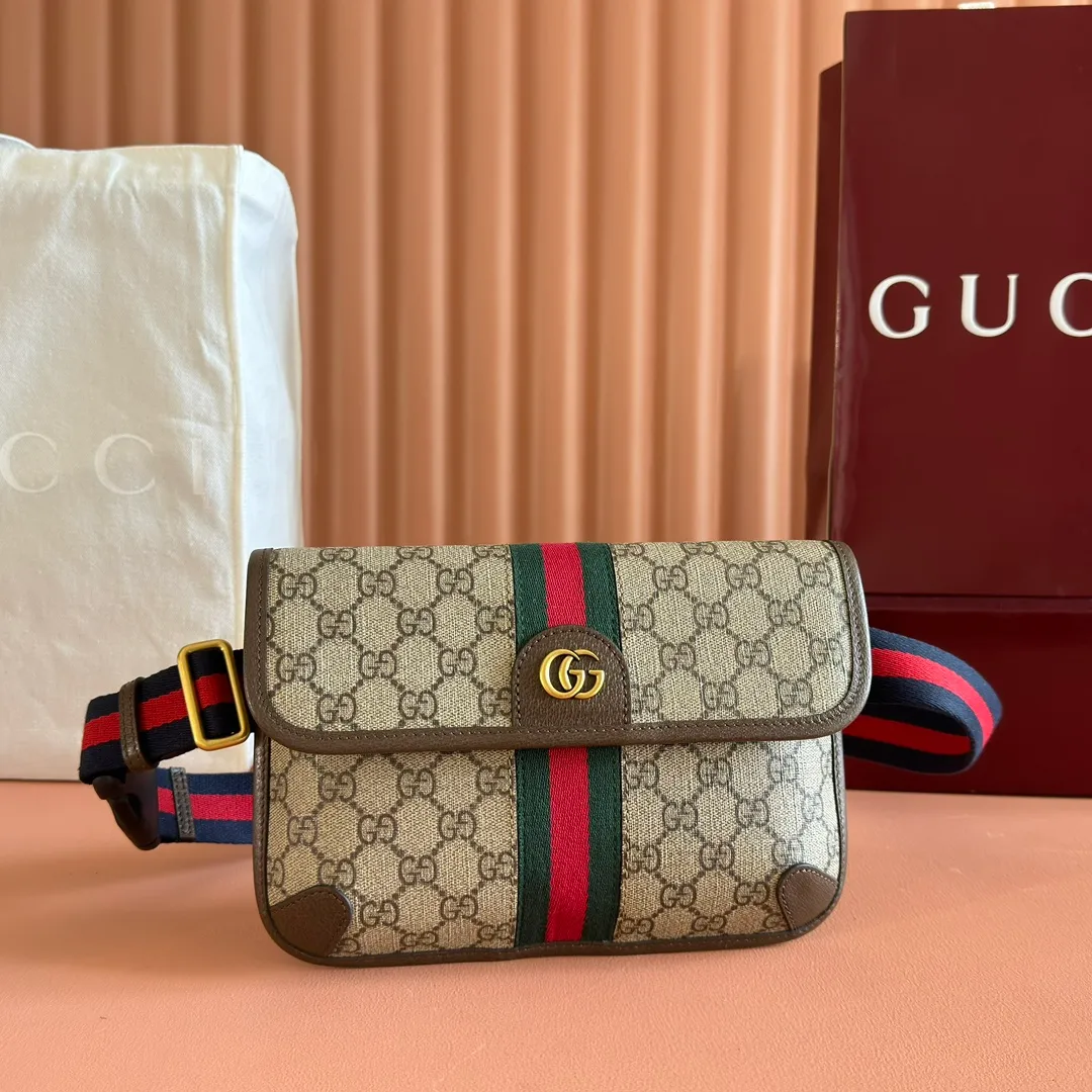p640. 📣📣📣【Original leather accessories🌈 Equipped with full counter packaging】🔥🔥 Ophidia series GG small waist bag. The Ophidia series combines the traditional essence of Gucci with modern design to present dazzling new works with ingenuity. This men's belt bag cleverly combines Double G hardware and GG Supreme canvas, a new interpretation of the classic material in gray and black. The waist strap is adjustable to create a variety of carrying options. Gray and black GG Supreme canvas, gray leather trim, palladium tone hardware, cotton and linen lining Double G, belt length adjustable from 52 to 81 cm, flap with magnetic snap closure, weight: approx. 0.37 kg. Model: 752597. Dimensions: 23.9 (width) x 17 (height) x 3.6cm (depth) Color: brown/pvc. Made in Italy