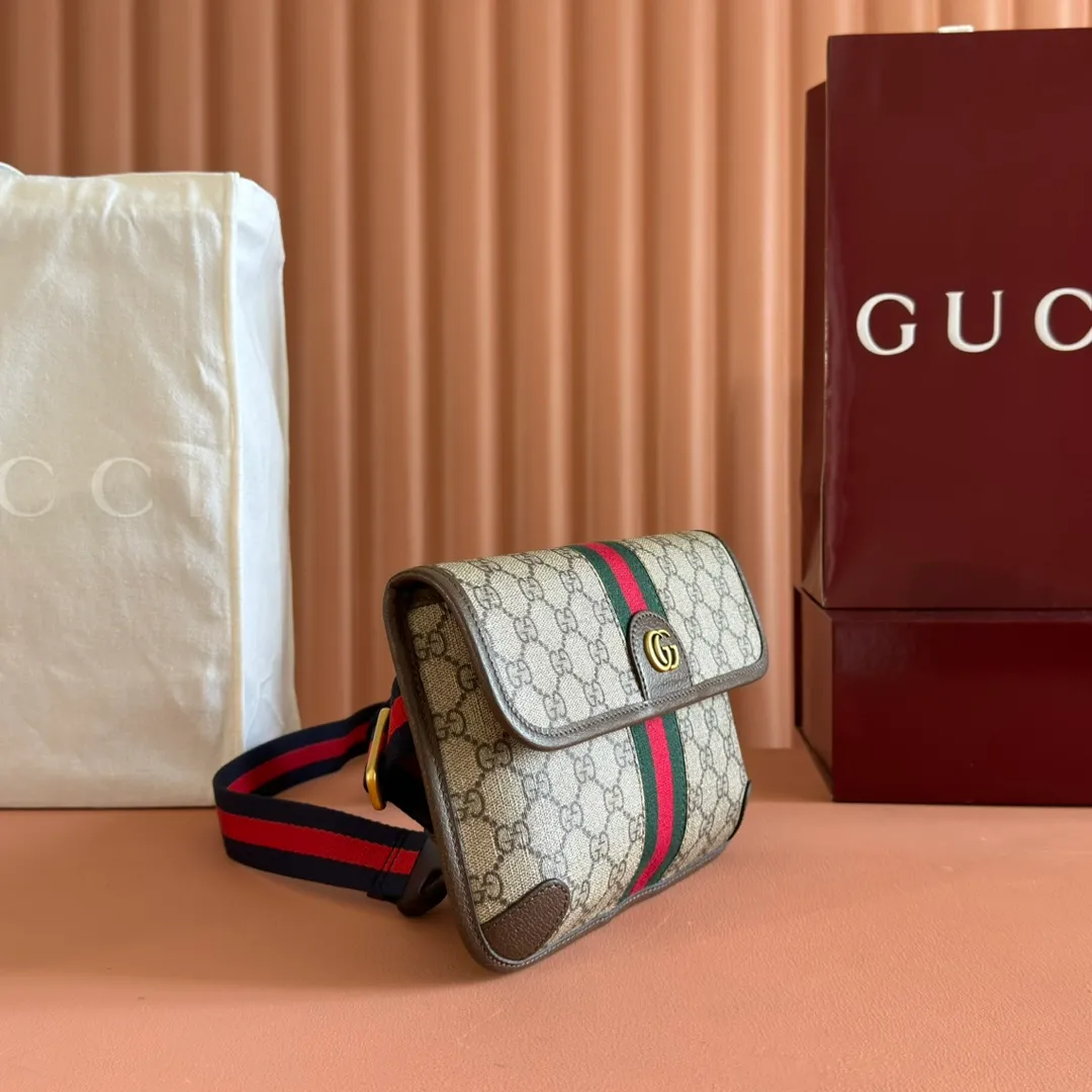 p640. 📣📣📣【Original leather accessories🌈 Equipped with full counter packaging】🔥🔥 Ophidia series GG small waist bag. The Ophidia series combines the traditional essence of Gucci with modern design to present dazzling new works with ingenuity. This men's belt bag cleverly combines Double G hardware and GG Supreme canvas, a new interpretation of the classic material in gray and black. The waist strap is adjustable to create a variety of carrying options. Gray and black GG Supreme canvas, gray leather trim, palladium tone hardware, cotton and linen lining Double G, belt length adjustable from 52 to 81 cm, flap with magnetic snap closure, weight: approx. 0.37 kg. Model: 752597. Dimensions: 23.9 (width) x 17 (height) x 3.6cm (depth) Color: brown/pvc. Made in Italy