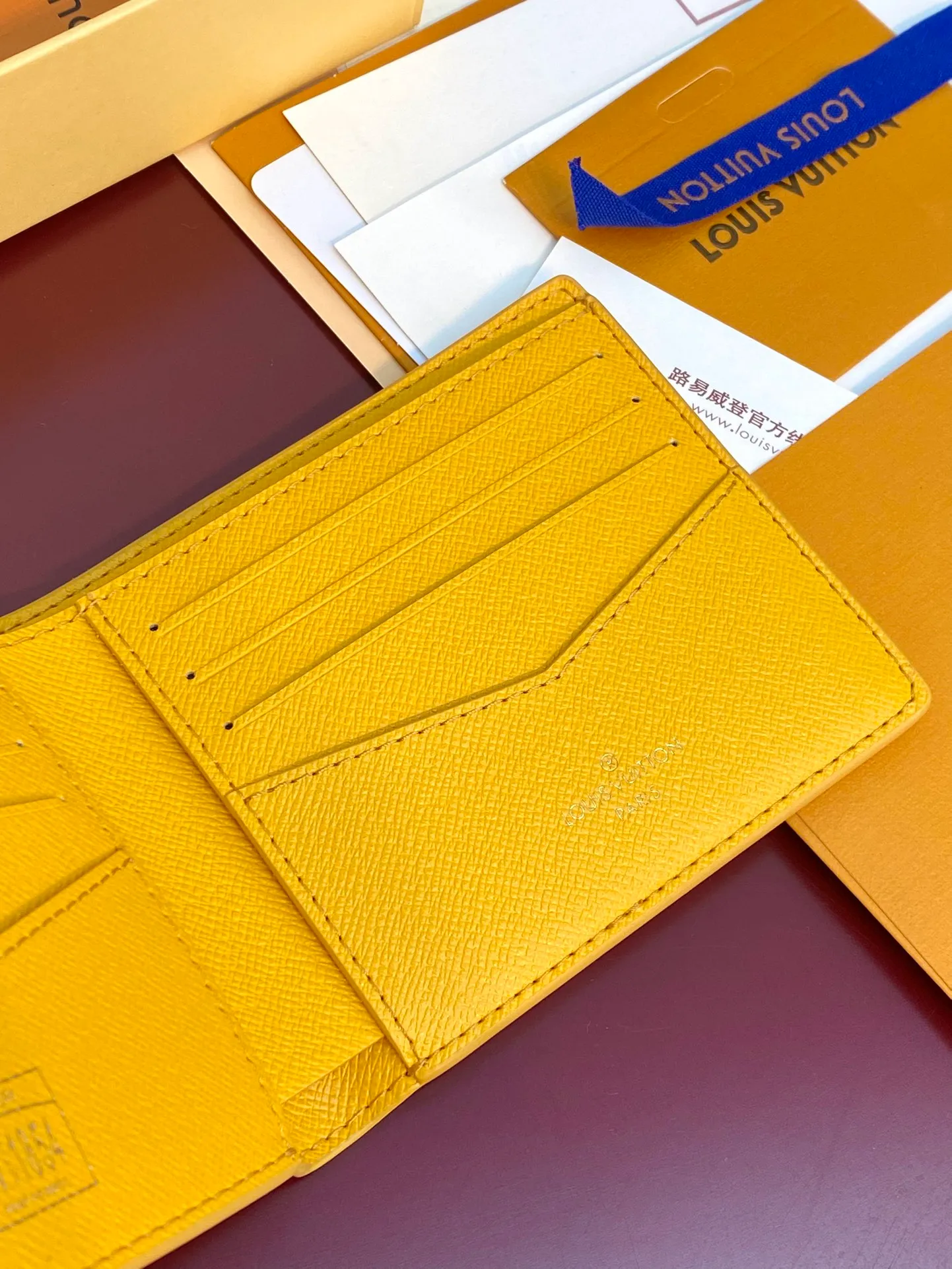 M12657 Yellow! MULTIPLE Wallet, this Multiple wallet is made of Monogram Heritage canvas to release a modern style, delicately showing the original Damier pattern details such as vertical and horizontal textures and Marque L.Vuitton Déposée logo.  9 x 1.5 x 11.5 cm (H x W x Length). 💰340