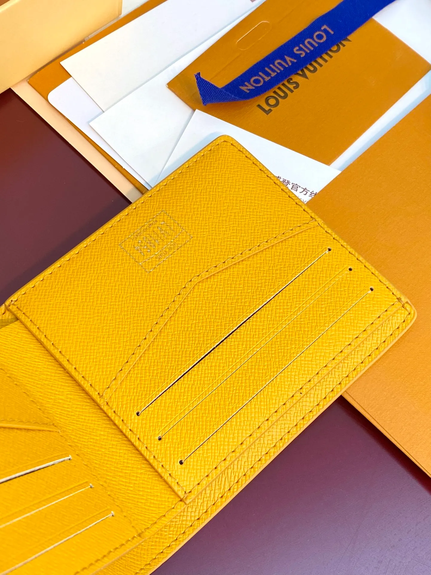 M12657 Yellow! MULTIPLE Wallet, this Multiple wallet is made of Monogram Heritage canvas to release a modern style, delicately showing the original Damier pattern details such as vertical and horizontal textures and Marque L.Vuitton Déposée logo.  9 x 1.5 x 11.5 cm (H x W x Length). 💰340