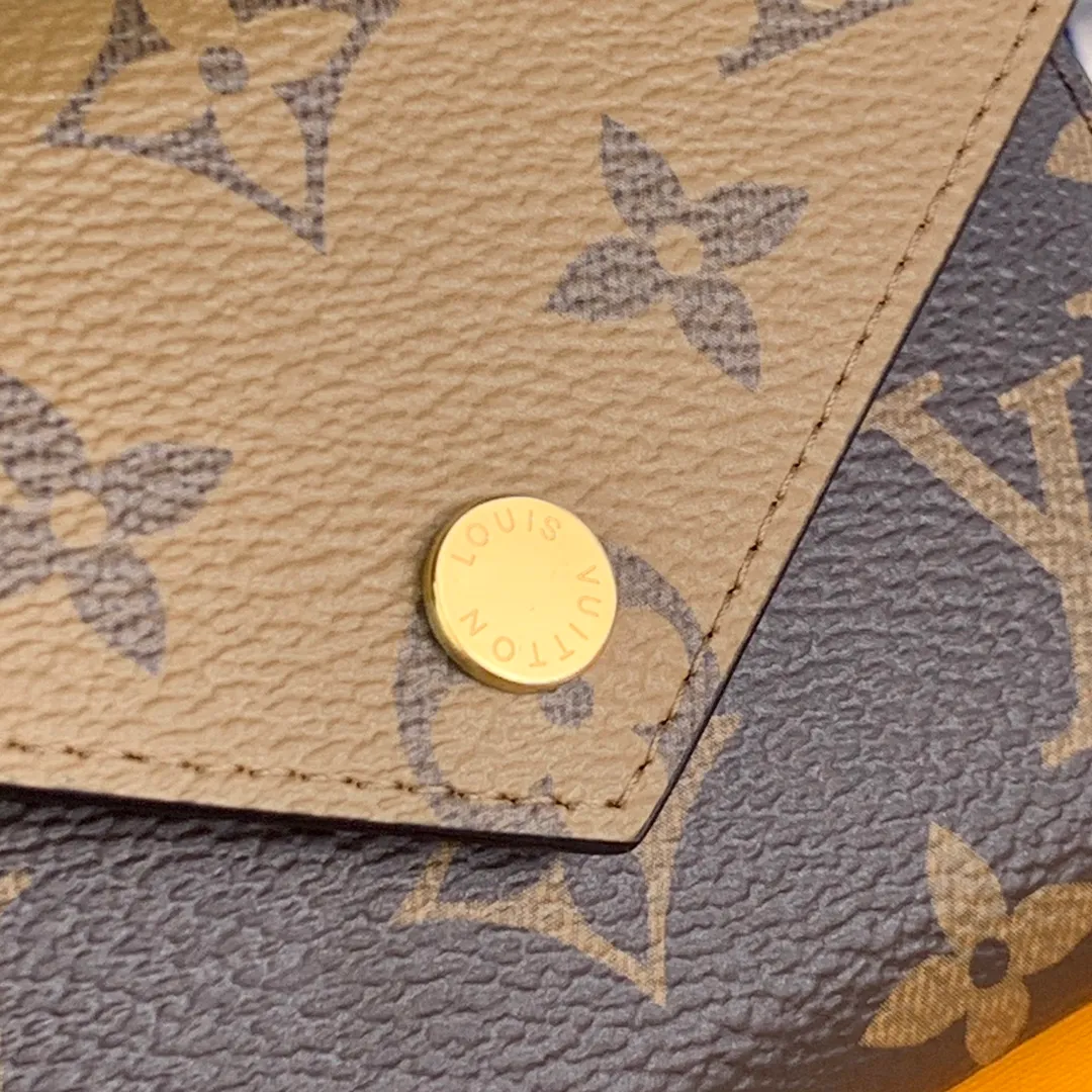 M81557 yellow flower! VICTORINE Wallet! Combining Monogram and Monogram Reverse canvas, the compact envelope-style design opens up plenty of space, including a banknote compartment, a card slot and a side zippered coin pocket. Size: 12 x 9.5 x 1.5cm. 💰340
