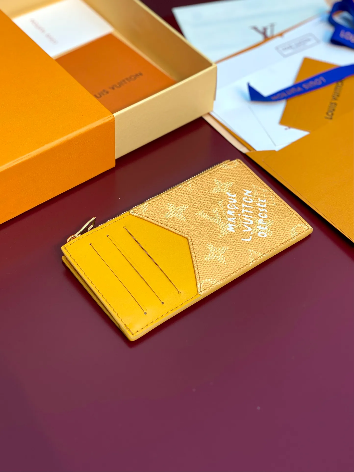 M12660 yellow! COIN card holder, Pharrell Williams draws on the traditional elements of the brand's Damier print. This time, the Coin card holder incorporates criss-crossing textures and the Marque L.Vuitton Déposée logo, creatively reshaping the classic Monogram pattern, combining practical function and elegant style.  14.5 x 1 x 8 cm (height x width x length). 💰320