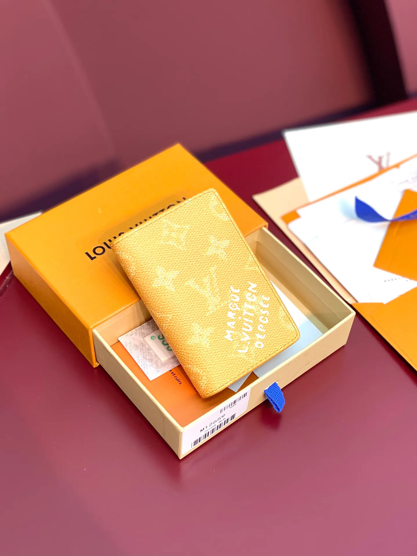 M12659 Yellow! Pocket wallet, this pocket wallet is made of Monogram Heritage coated canvas, which is integrated with classic elements such as the vertical and horizontal texture of Damier check and the Marque L.Vuitton Déposée logo, showing Pharrell Williams' modern interpretation of the Monogram pattern.  11.1 x 1 x 7.5 cm (height x width x length). 💰320