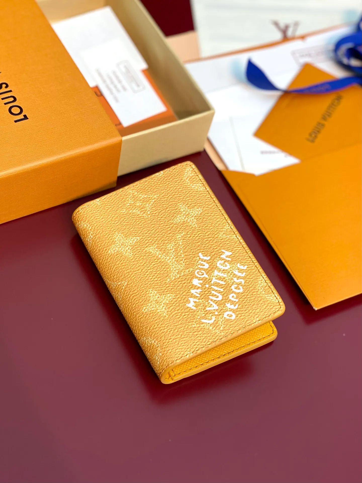 M12659 Yellow! Pocket wallet, this pocket wallet is made of Monogram Heritage coated canvas, which is integrated with classic elements such as the vertical and horizontal texture of Damier check and the Marque L.Vuitton Déposée logo, showing Pharrell Williams' modern interpretation of the Monogram pattern.  11.1 x 1 x 7.5 cm (height x width x length). 💰320